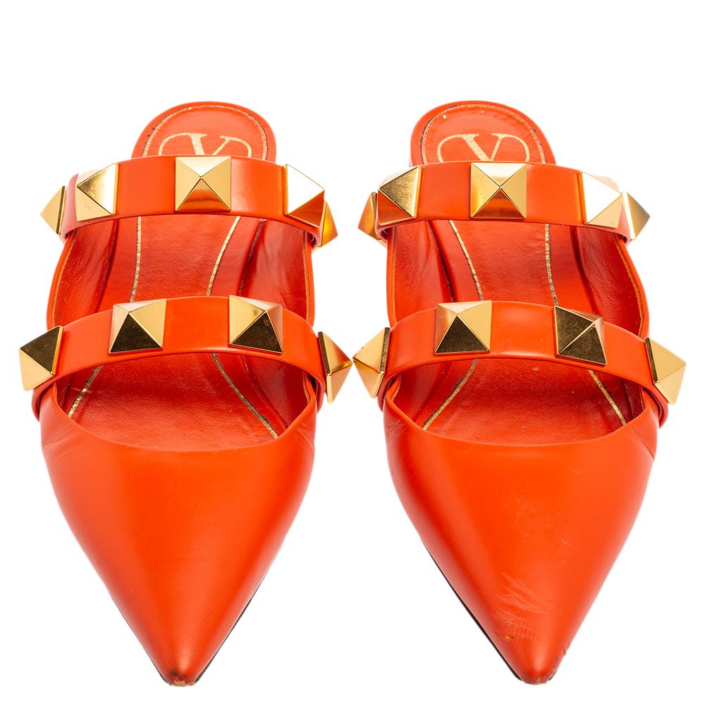Valentino shoes are known for their unique designs that emanate the label's feminine verve and immaculate craftsmanship that makes their creations last season after season. Crafted from leather in an orange shade, the straps are adorned with the