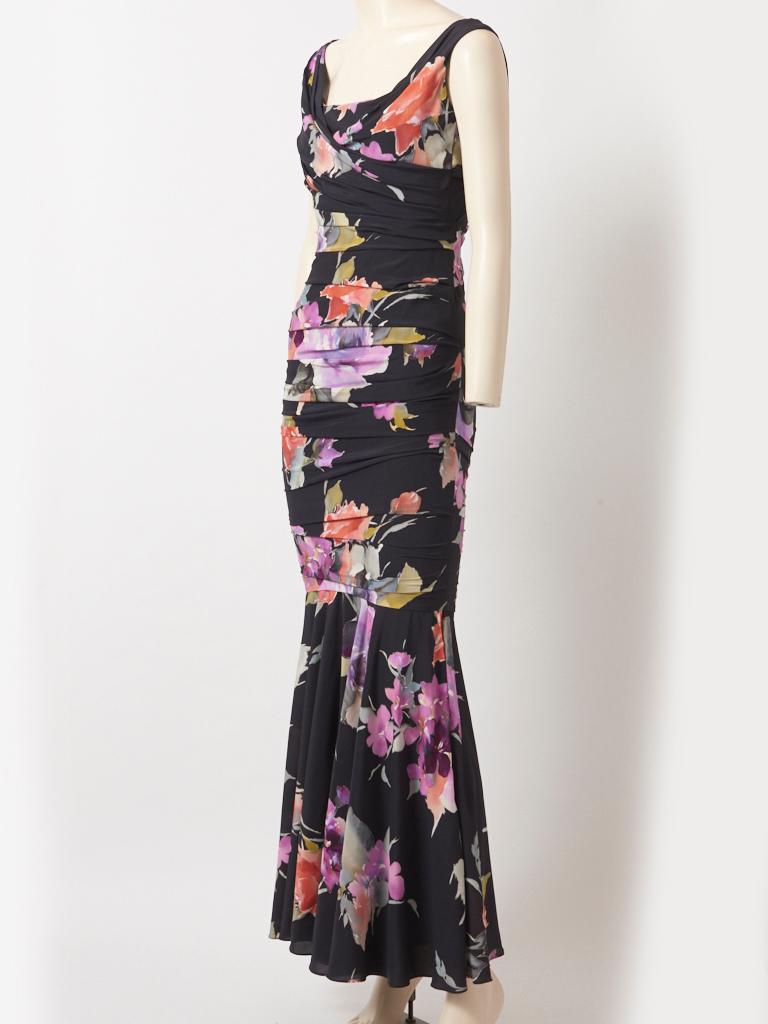 Valentino, multi tone, painterly floral, pattern, on a black ground, sleeveless, silk crepe, maxi dress, having a draped, fitted bodice with a soft, cowl neckline. The dress continues to be fitted at the hips, with ruching detail, until above the