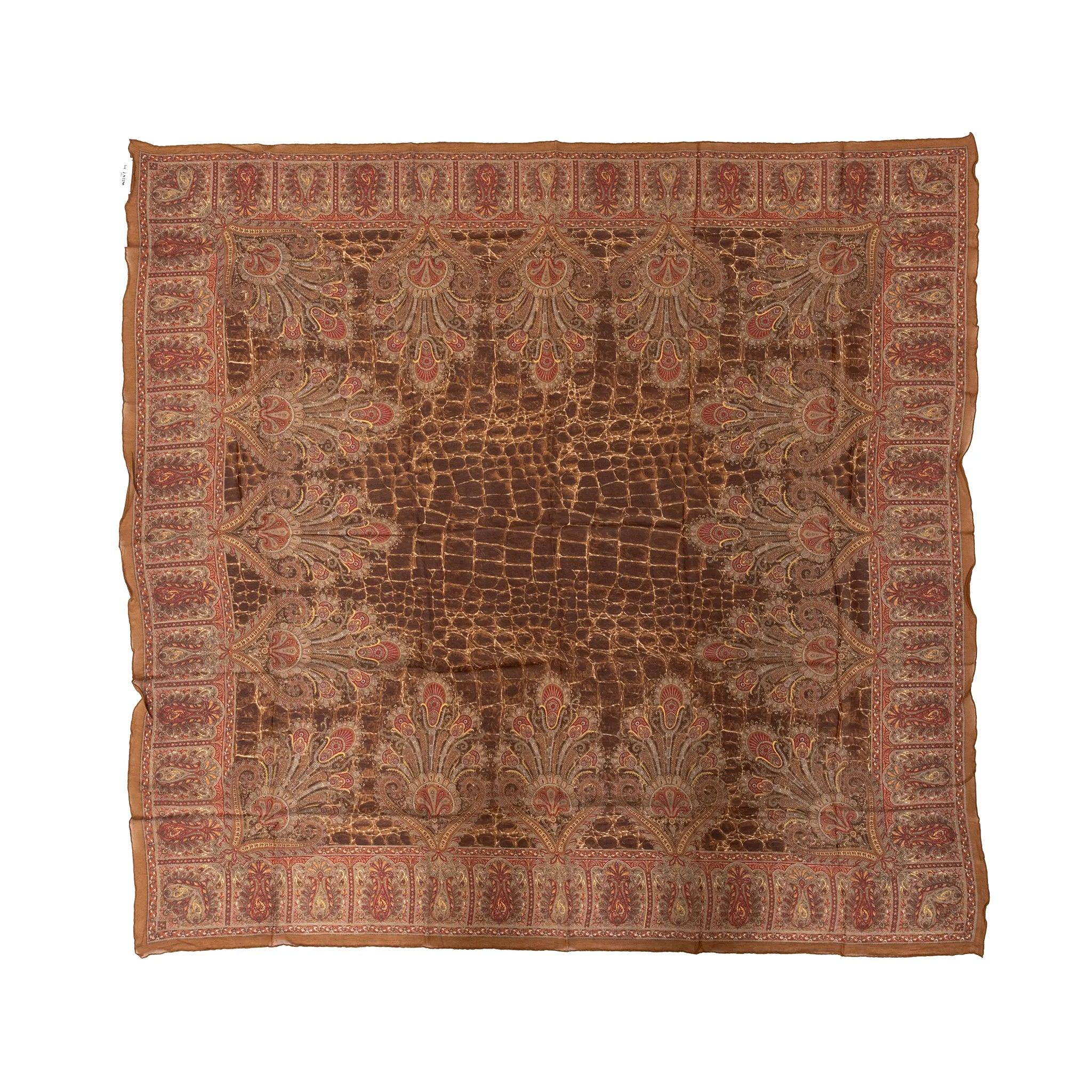 Valentino chiffon scarf from Miss V label, featuring paisley prints around a unique animal skin pattern center, and delicate rolled edges. 
 Inclusion: envelope-style folder. 
 Remarks: No composition tag. 
 Material: Silk 
 Measurements:
