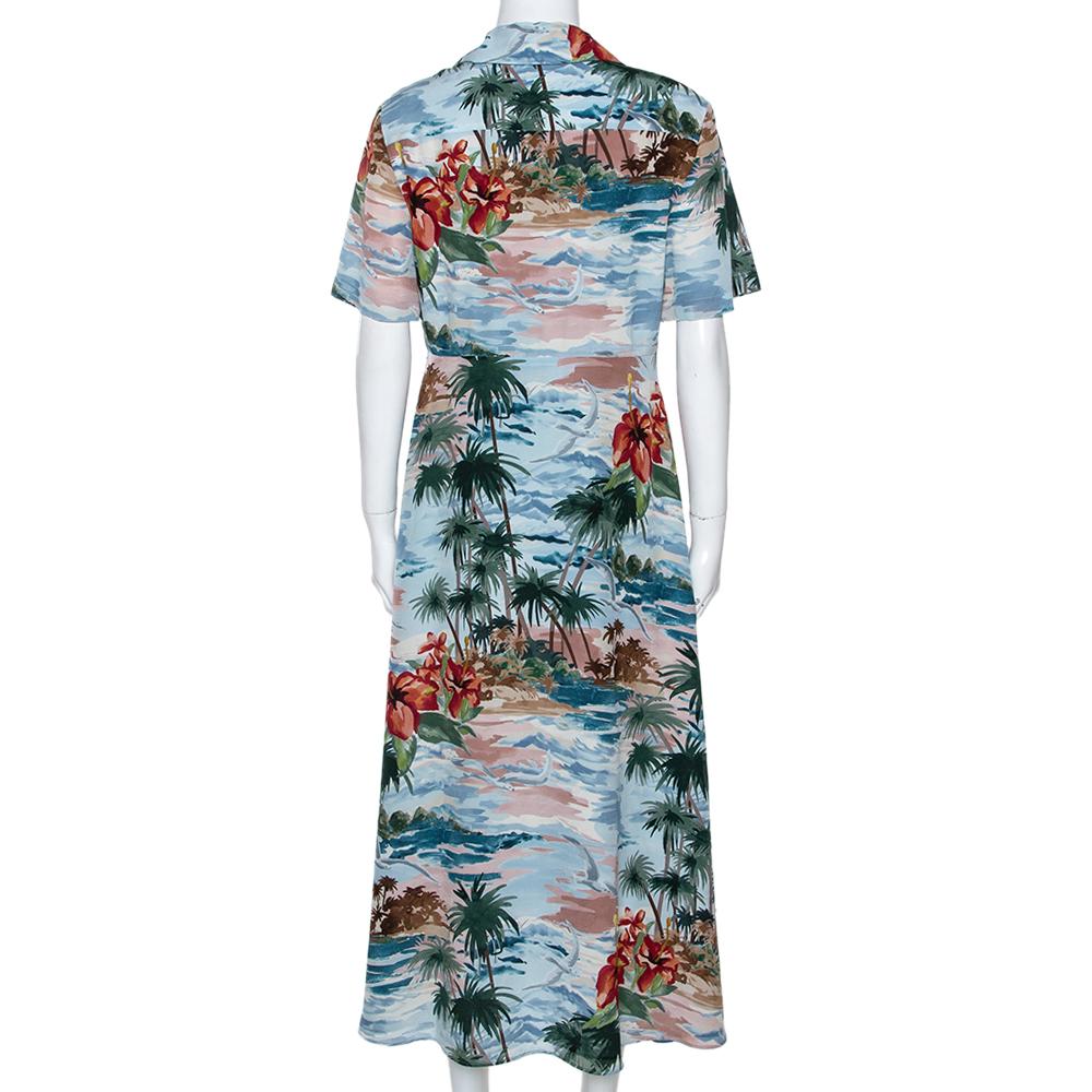 This smart shirt dress from Valentino definitely needs to be on your wishlist! The dress is made of silk and features a Hawaiian print all over it. It has front buttons, simple lapels, long hem and short sleeves. Pair it with Mary-Jane pumps and a