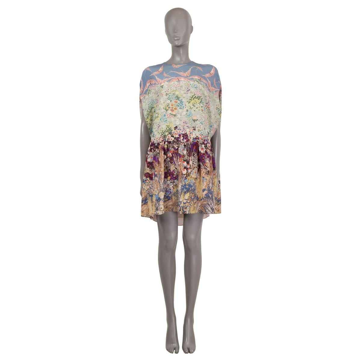 100% authentic Valentino mini dress with multicolor landscape and flamingo print in crepe de chine silk (100%). Features cape-inspired sleeves, round neck, dropped waist with a gathered skirt. Closes with a concealed zipper in the back. Lined in