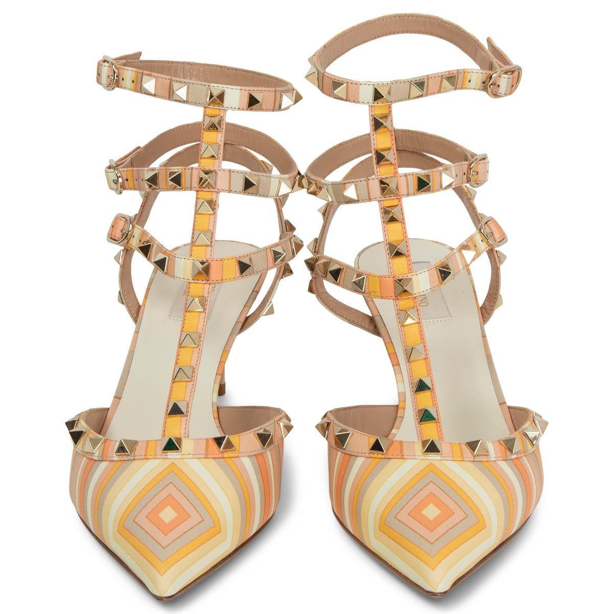 100% authentic Valentino Native Couture Rockstud 65 Ankle Strap Sandals in vanilla, salmon, orange and light taupe leather featuring signature gold-tone pyramid studs. Brand new. Come with dust bag. 

Measurements
Model	KW2S0375 VO7
Imprinted
