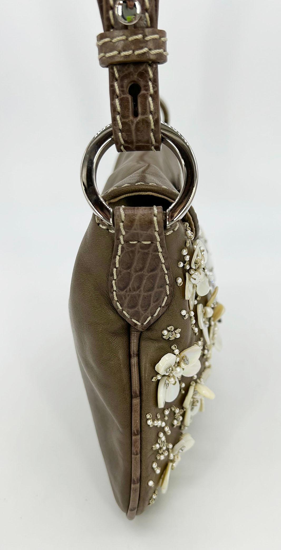 Valentino Pearl Beaded Leather Crystal Shoulder Baguette in good condition. Brown leather body trimmed with alligator leather piping and handle. Silver hardware. Front side features beautiful pearl beaded flowers.  Front magnetic flap strap closure