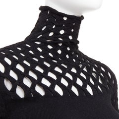 Valentino Piccioli 2021 : col roulé en maille ajourée à motif en treillis de diamants noirs M