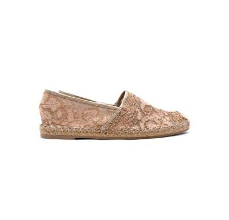 Valentino Pink and Gold Lace Espadrilles

-Round cap toe 
-Branded leather insoles 
-Slip-on 
-Braided jute details on the midsoles
-Lace & leather exterior
-Rubber soles 

Material: 

Rubber 
Leather 
Lace 

Made in Italy 

9.5/10 excellent