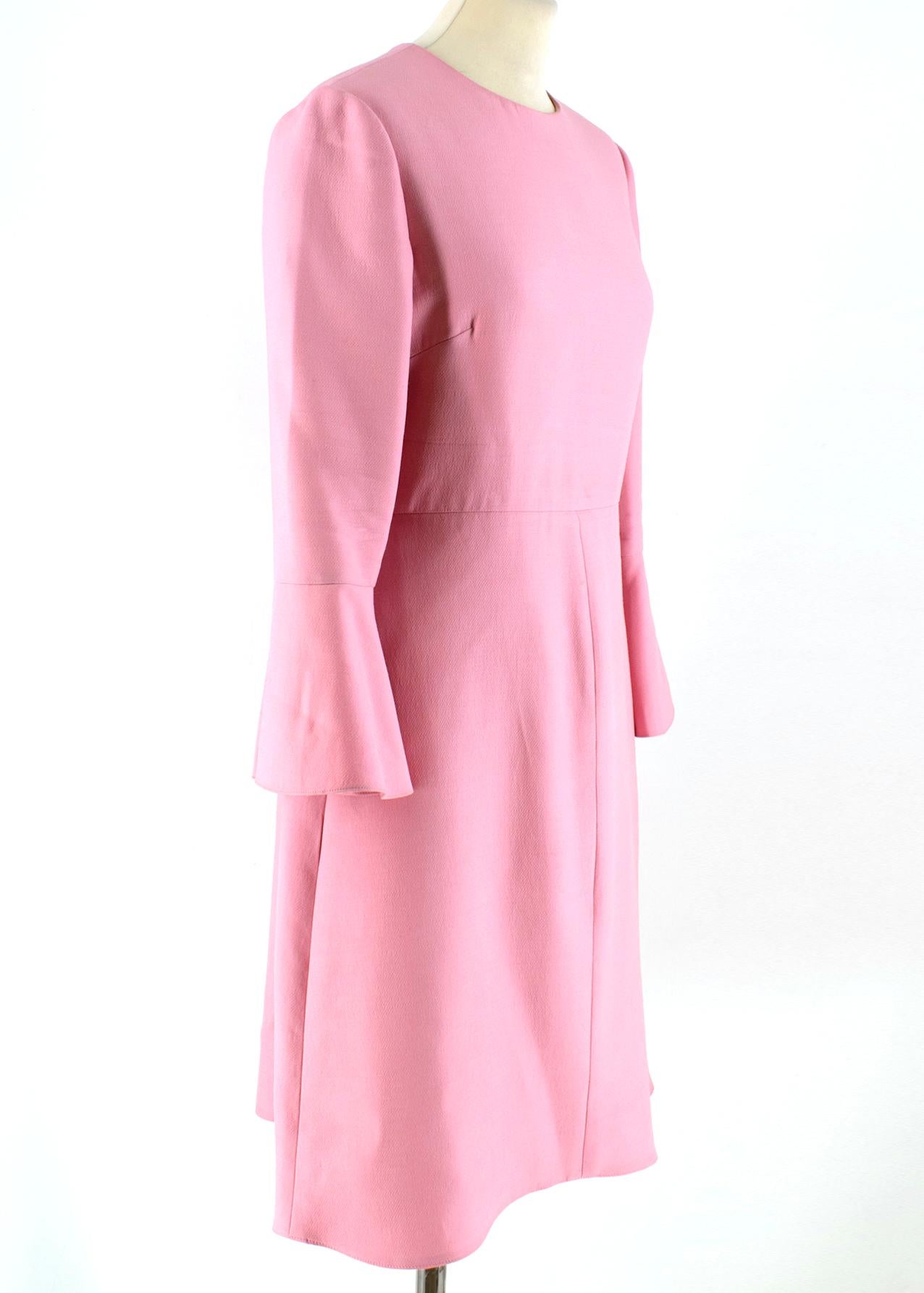 Valentino Pink Ruffle Sleeve Dress 

- Pink Midi Dress
- Round neck, mid-sleeved 
- Flared ruffle sleeves 
- Seams at waist and skirt 
- Zip fastening closure at back 
- Silk lining
- 65% Wool, 35% Silk 

Please note, these items are pre-owned and