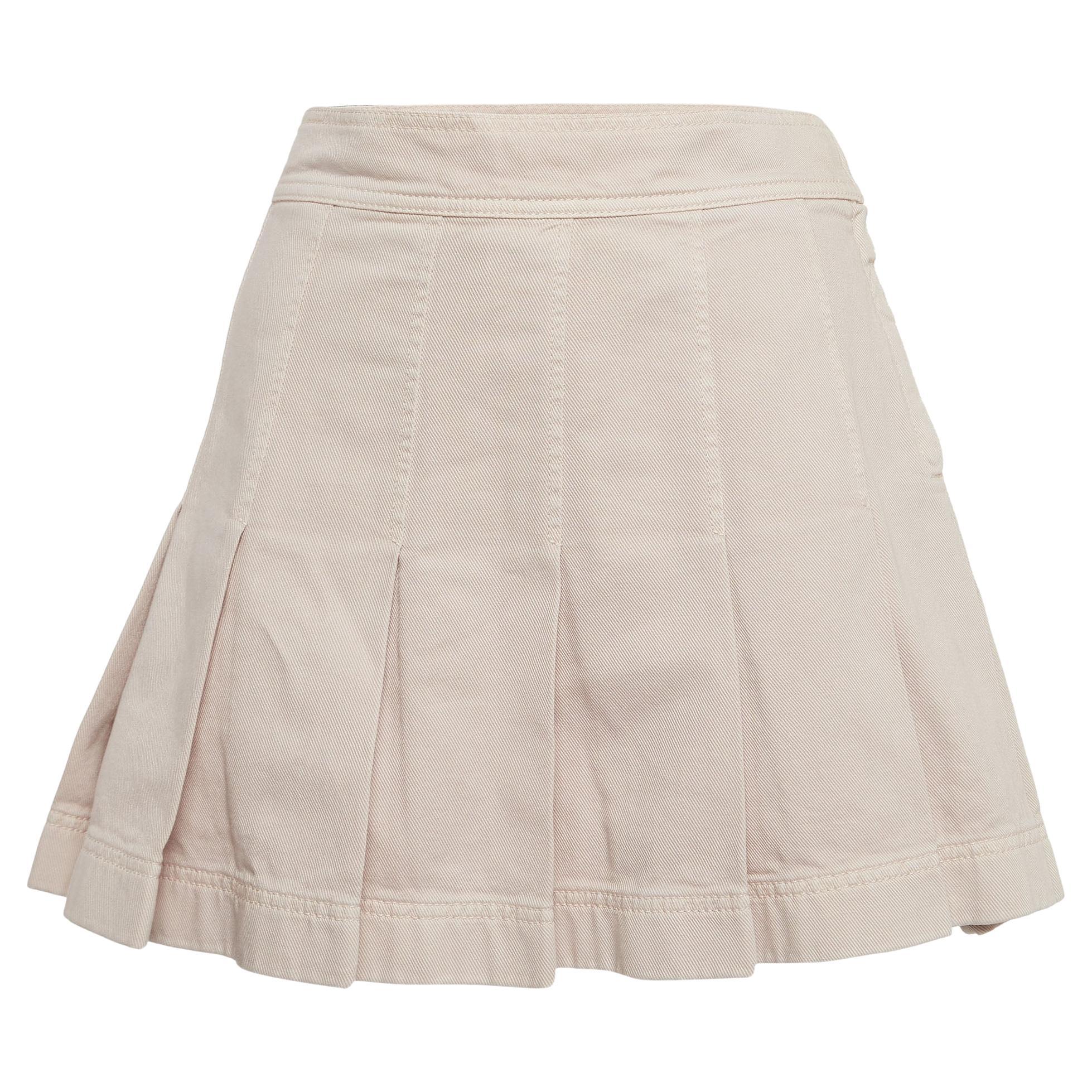 This lovely skirt is beautifully stitched from fine fabric. The comfy designer skirt has a flattering silhouette. Pair it with a simple top and strappy heels for a chic look.

Includes: Brand Tag