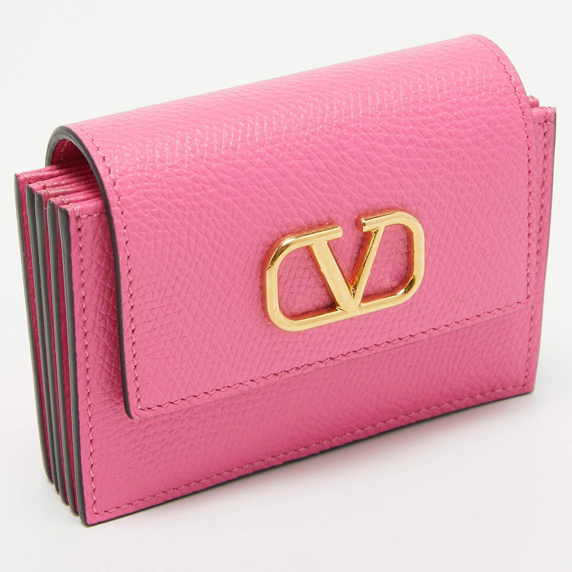 The Valentino card holder is a practical accessory highlighted by the famous VLogo. This compact and stylish piece is perfect for organizing and carrying your cards and cash with a touch of elegance.

Includes
Original Dustbag, Original Box, Info