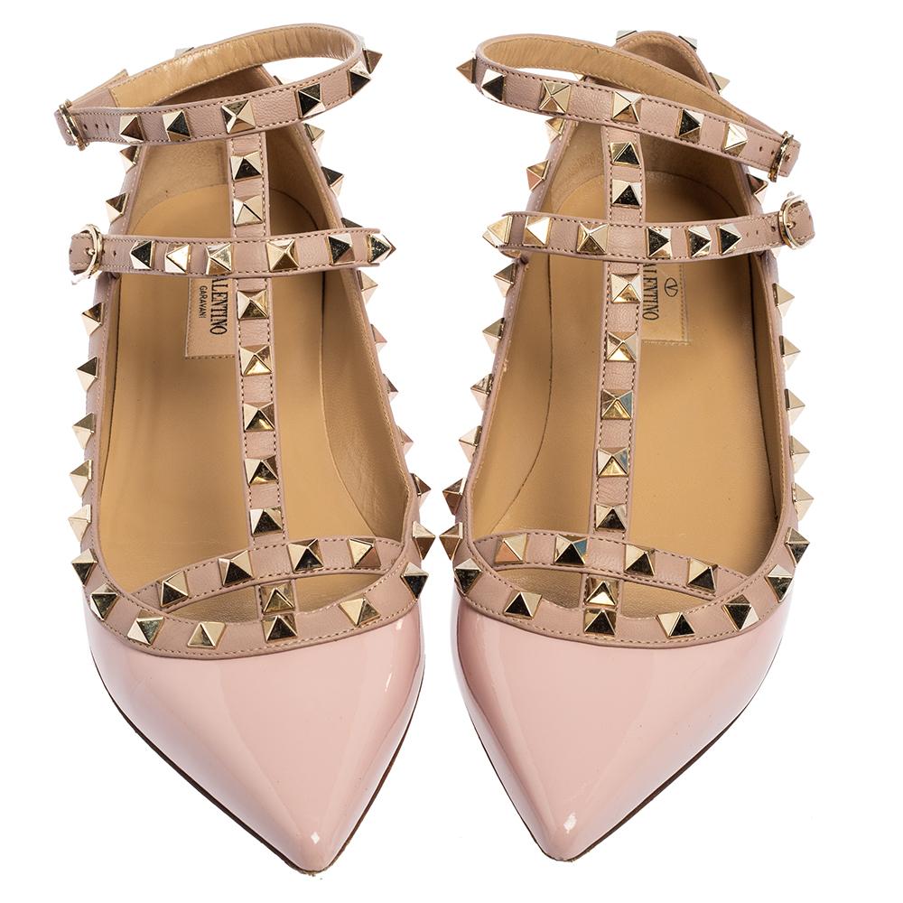 When considering Valentino, three words come to mind: luxurious, bold, and iconic. These gorgeous flats are crafted from patent leather, and the sleek caged silhouette is adorned with carefully placed Rockstuds. They are complete with pointed toes