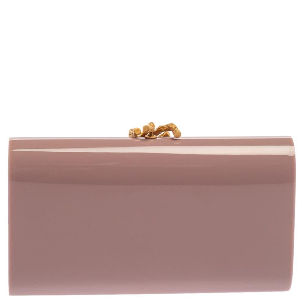 This gorgeous clutch from Valentino, sculpted into a body silhouette, is highlighted by a gold-tone twig-like detail on the front. This Runaway clutch will add instant polish to your statement evening looks.


Includes: Original Box,Original