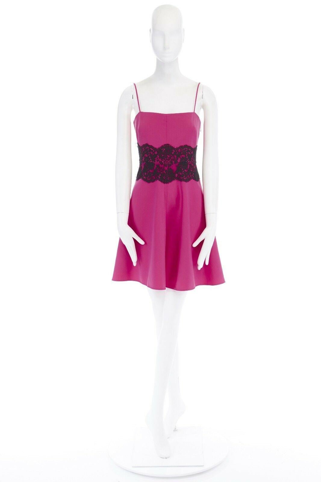 VALENTINO pink wool blend black lace trimmed waist flared skirt dress IT42 M 
Reference: LACG/A00110 
Brand: Valentino 
Material: Wool 
Color: Pink 
Pattern: Other 
Closure: Zip 
Extra Detail: Wool, polyamide, elastane. Fuchsia pink. Spaghetti