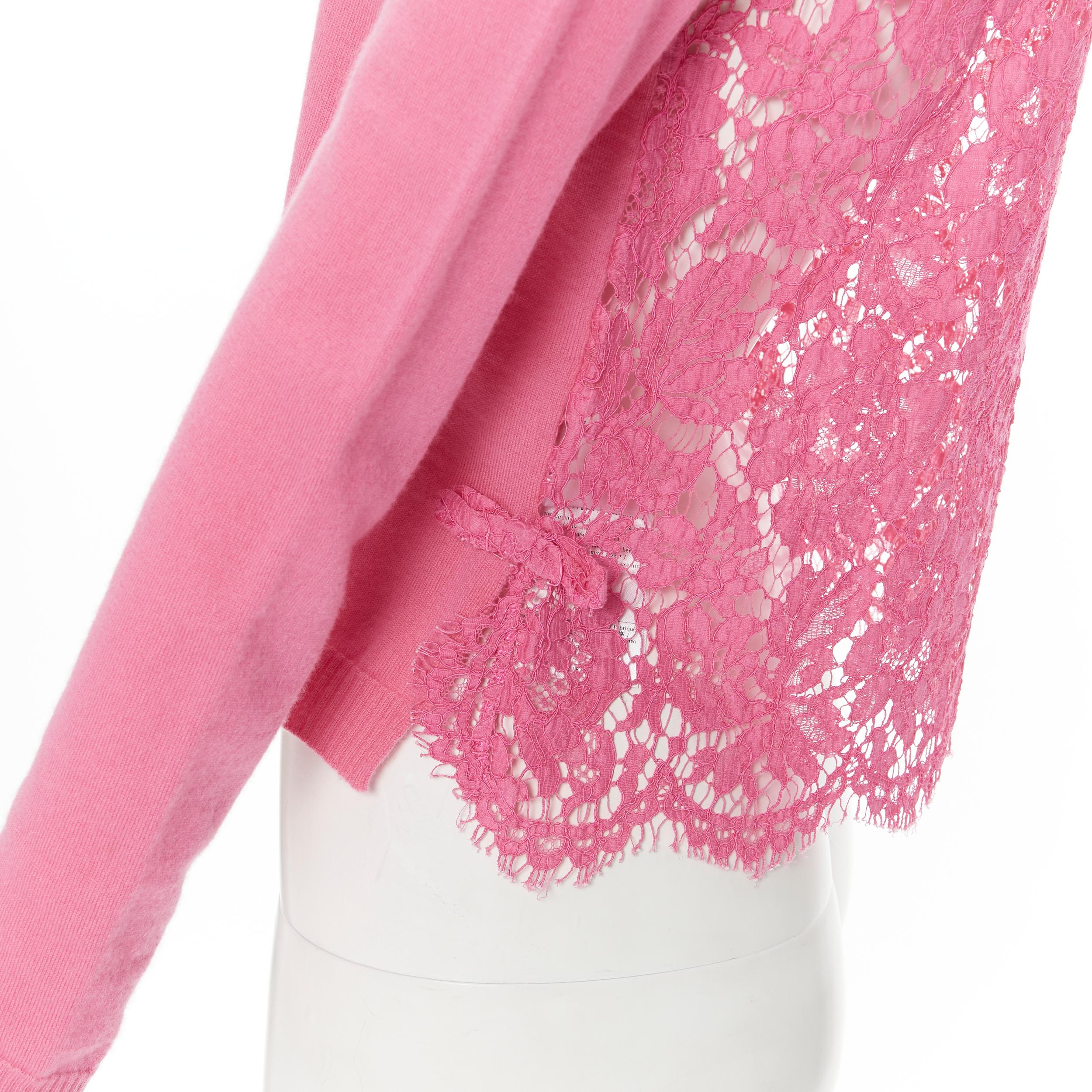 VALENTINO pink wool cashmere floral lace back ribbon bow cropped sweater S Reference: LNKO/A01826 Brand: Valentino Material: Cashmere Color: Pink Pattern: Solid Extra Detail: Lace back. Bow detail on side. Crew neck. Made in: Italy CONDITION: