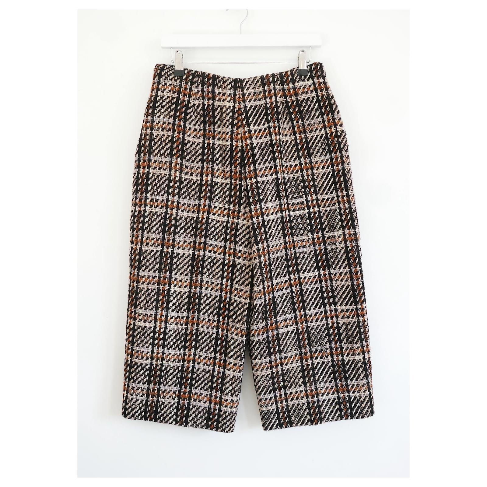 Cute and chic Valentino tweed culottes from the Pre-Fall 2014 collection. Look 41. Unworn. Made from thick jumbo tweed in shades of brown, beige and black. They have wide legs with slanted hip pockets, high waist and side zip. Lined in soft black