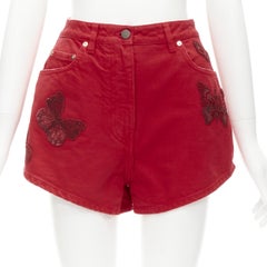 VALENTINO red beaded embellished butterfly patched high rise shorts 25"