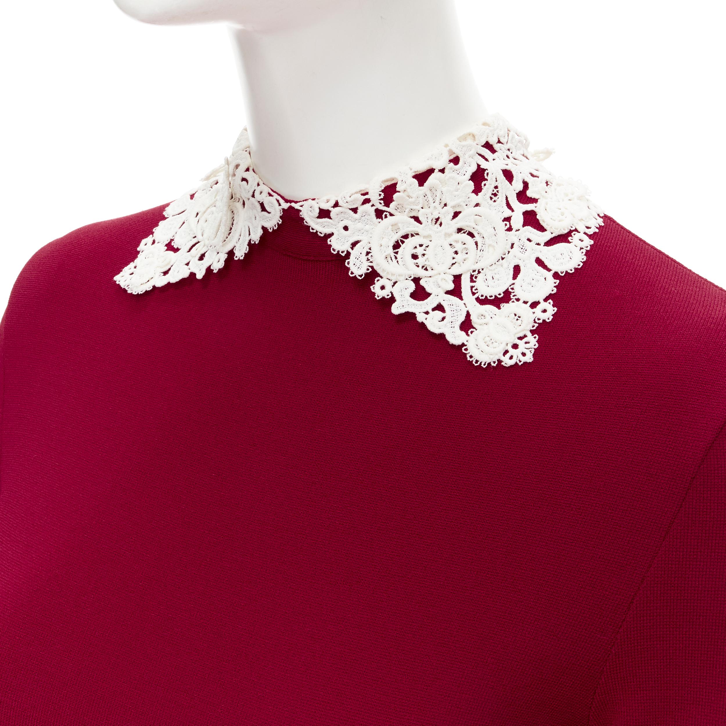 VALENTINO red knitted white lace collar bodycon sheath dress S 
Reference: MELK/A00097 
Brand: Valentino 
Material: Viscose 
Color: Red 
Pattern: Solid 
Closure: Zip 
Extra Detail: Fit dart at waist. 
Made in: Italy 

CONDITION: 
Condition: Good,
