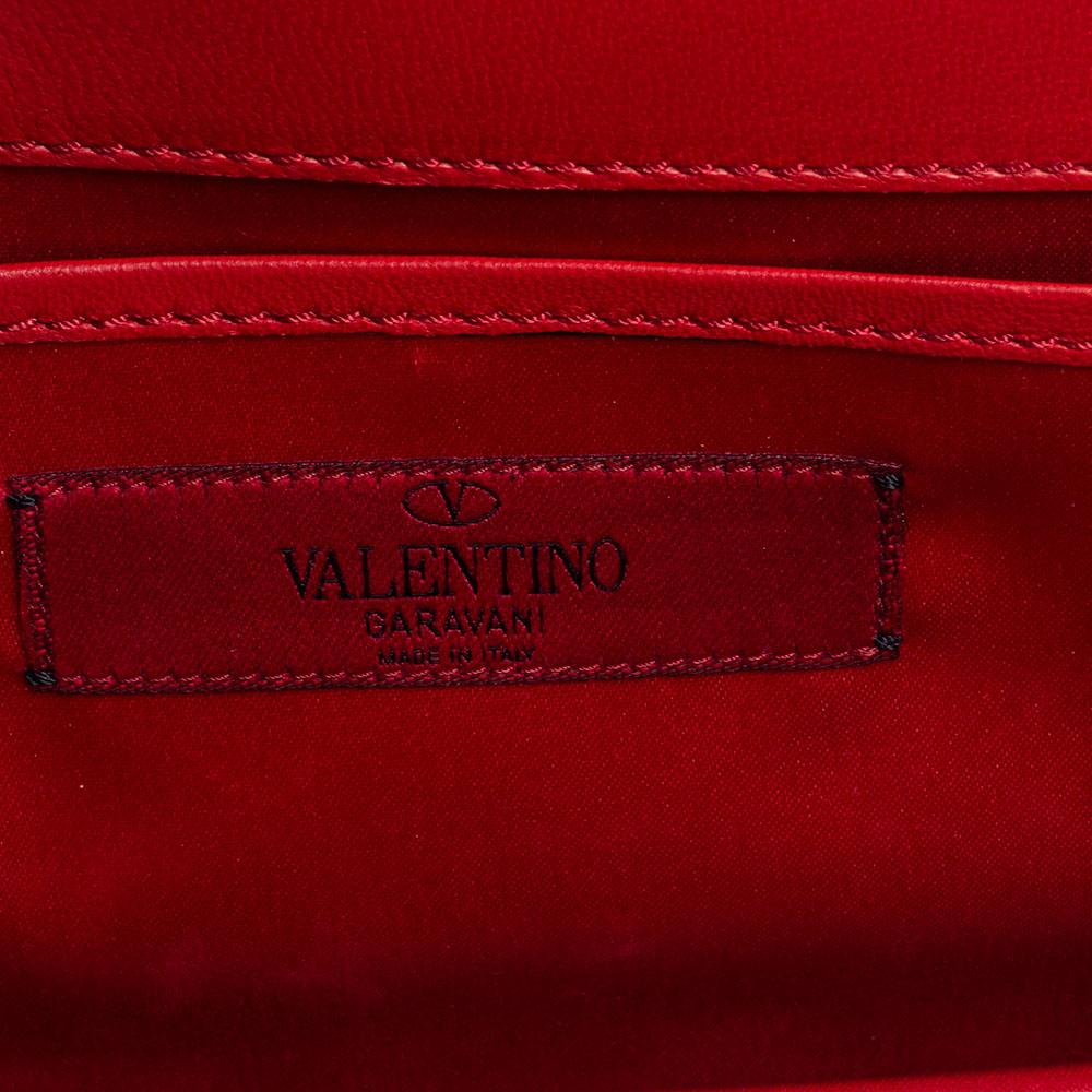 red pleated bag