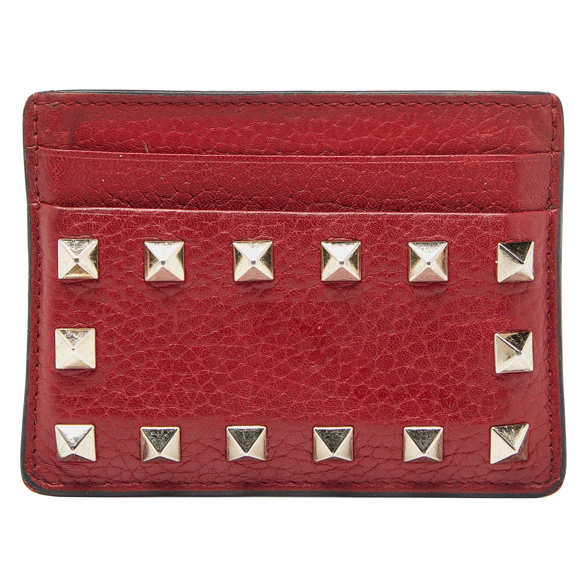 Tarjetero Rockstud de piel roja Valentino en venta