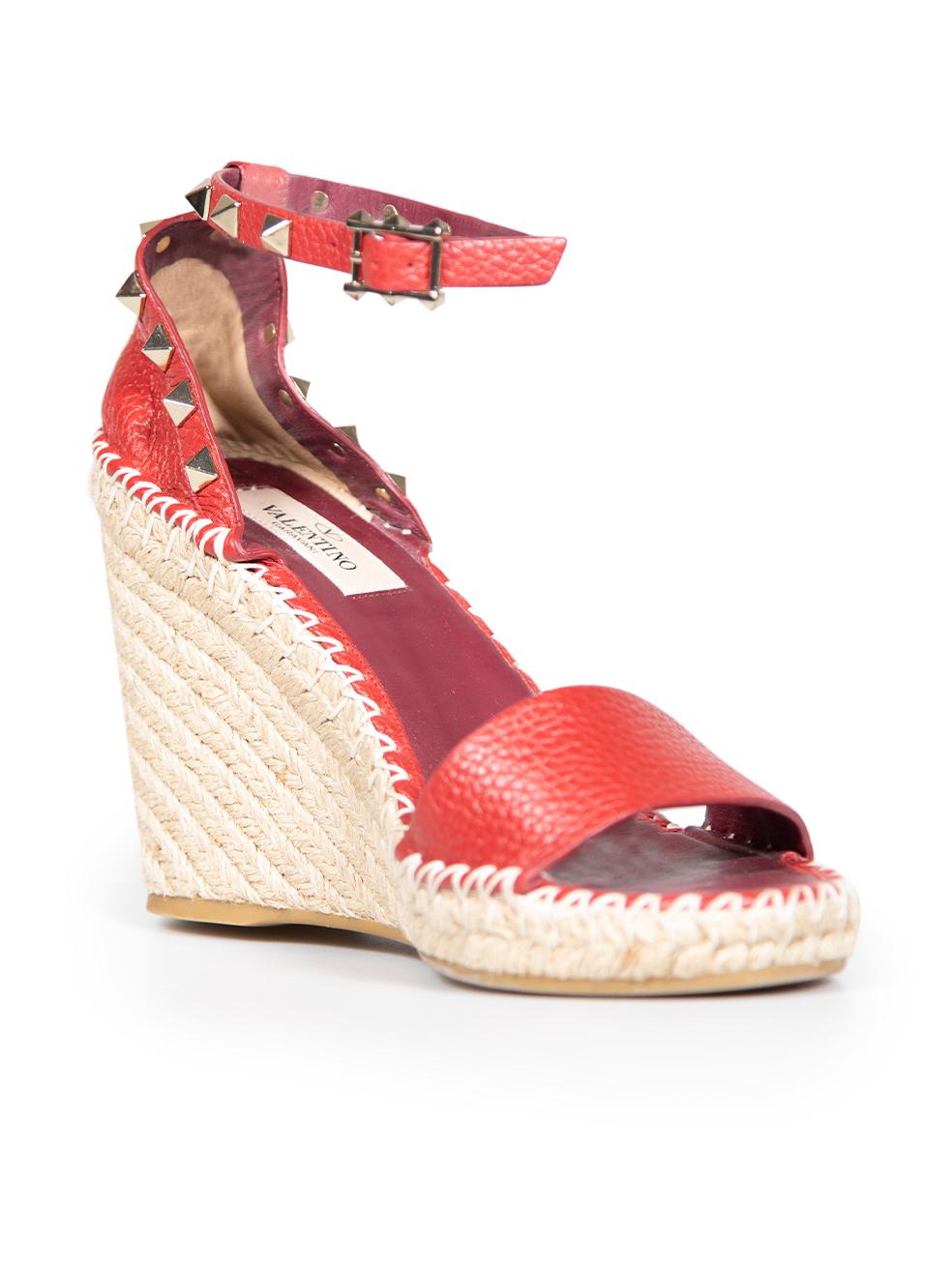 CONDITION is Very good. Hardly any visible wear to shoes is evident on this used Valentino designer resale item. These shoes come with original dust bags.
 
 Details
 Red
 Leather
 Espadrille wedges
 High heeled
 Rockstud detail
 Open toe
