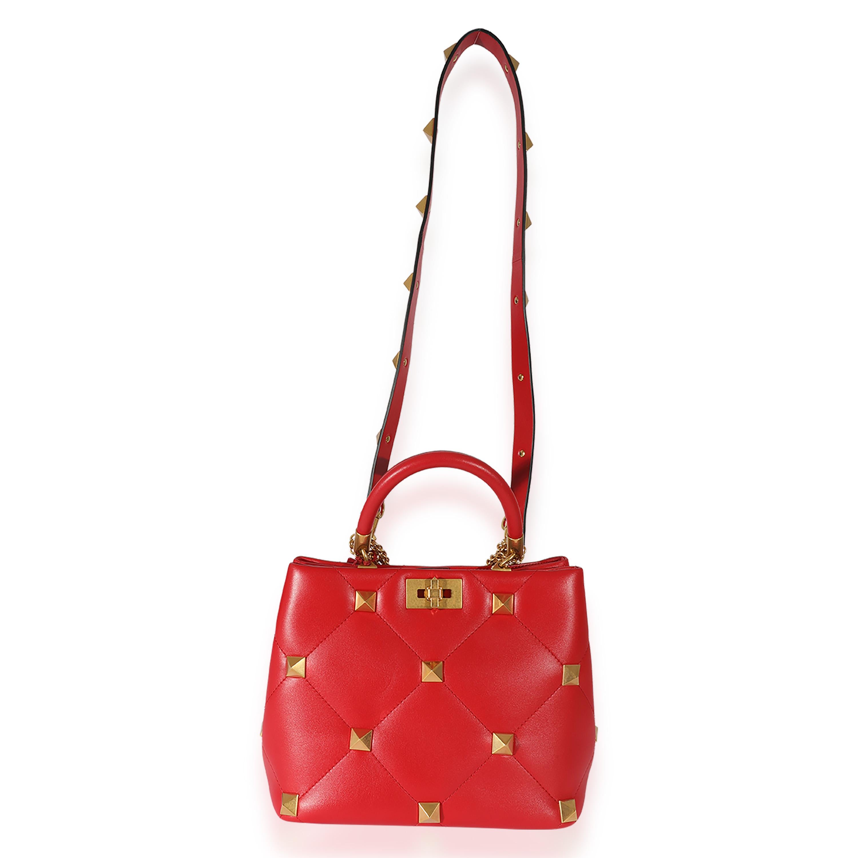 Listing Title: Valentino Red Leather Roman Stud Top Handle
SKU: 126382
MSRP: 3400.00
Condition: Pre-owned 
Handbag Condition: Very Good
Condition Comments: Very Good Condition. Scuffing and marks at strap. Faint scuffing at corners, base and