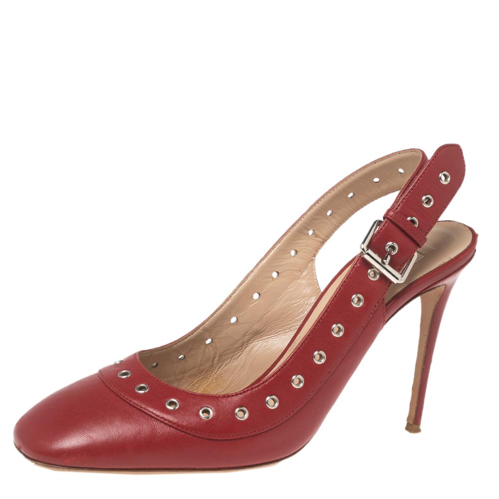 This timeless pair of platform sandals from Valentino looks even better on the feet. The shoes have an elegant design made from red leather, with high heels, and buckle slingbacks for a sleek finish.

