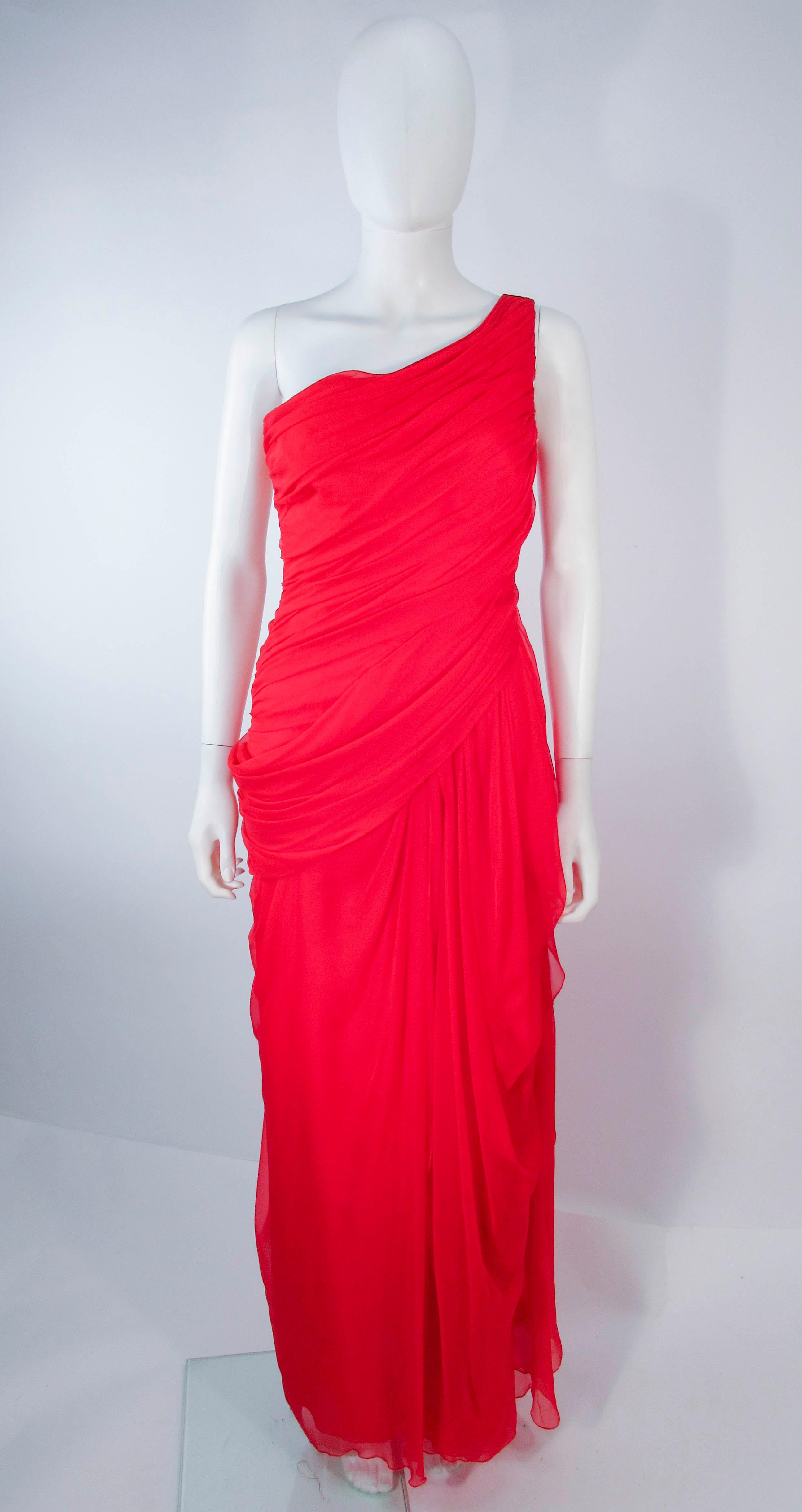 Valentino evening gown 
Red silk chiffon 
One-shoulder 
Side zipper and boning 
Diagonal pleat details 
Fully lined 
Made in Italy 
