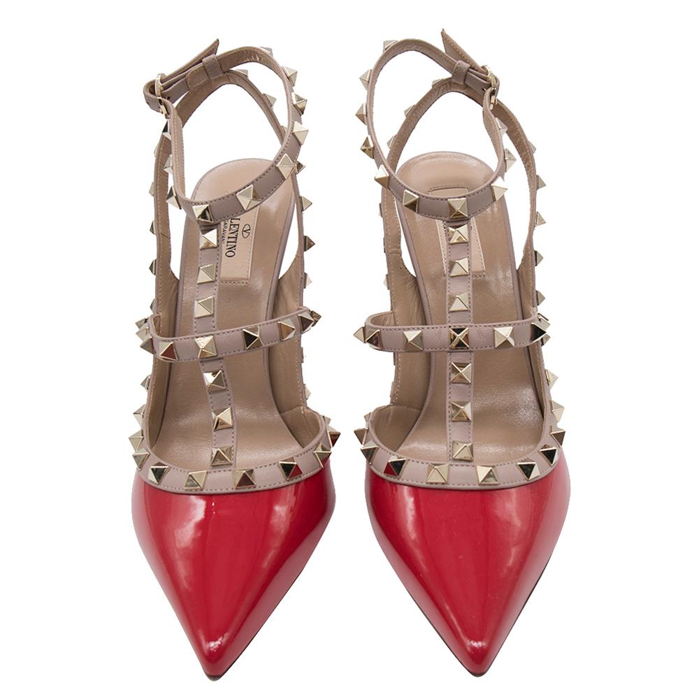 You've seen them being worn by several celebrities and it's time you get them for yourself! Yes, these Rockstud sandals from Valentino are on every woman's wishlist. These red ones come crafted from patent leather and styled with pointed toes. They