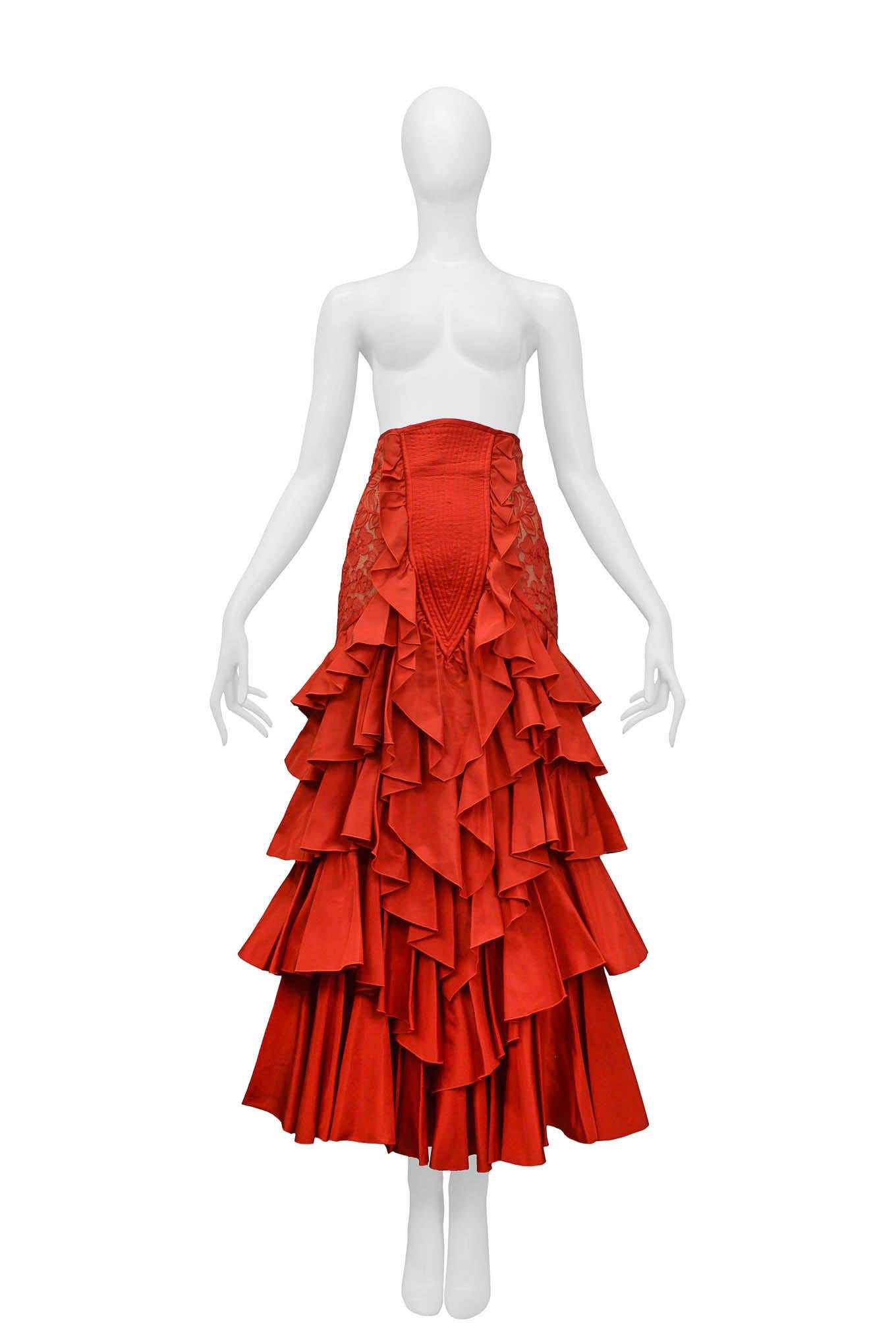 Resurrection Vintage is excited to offer a vintage Valentino red ball gown skirt featuring 5 tiers of ruffles, lace paneling on the sides, and a zipper at the center back

Valentino
Size 6
100% Nylon
Excellent Vintage Condition 
Authenticity