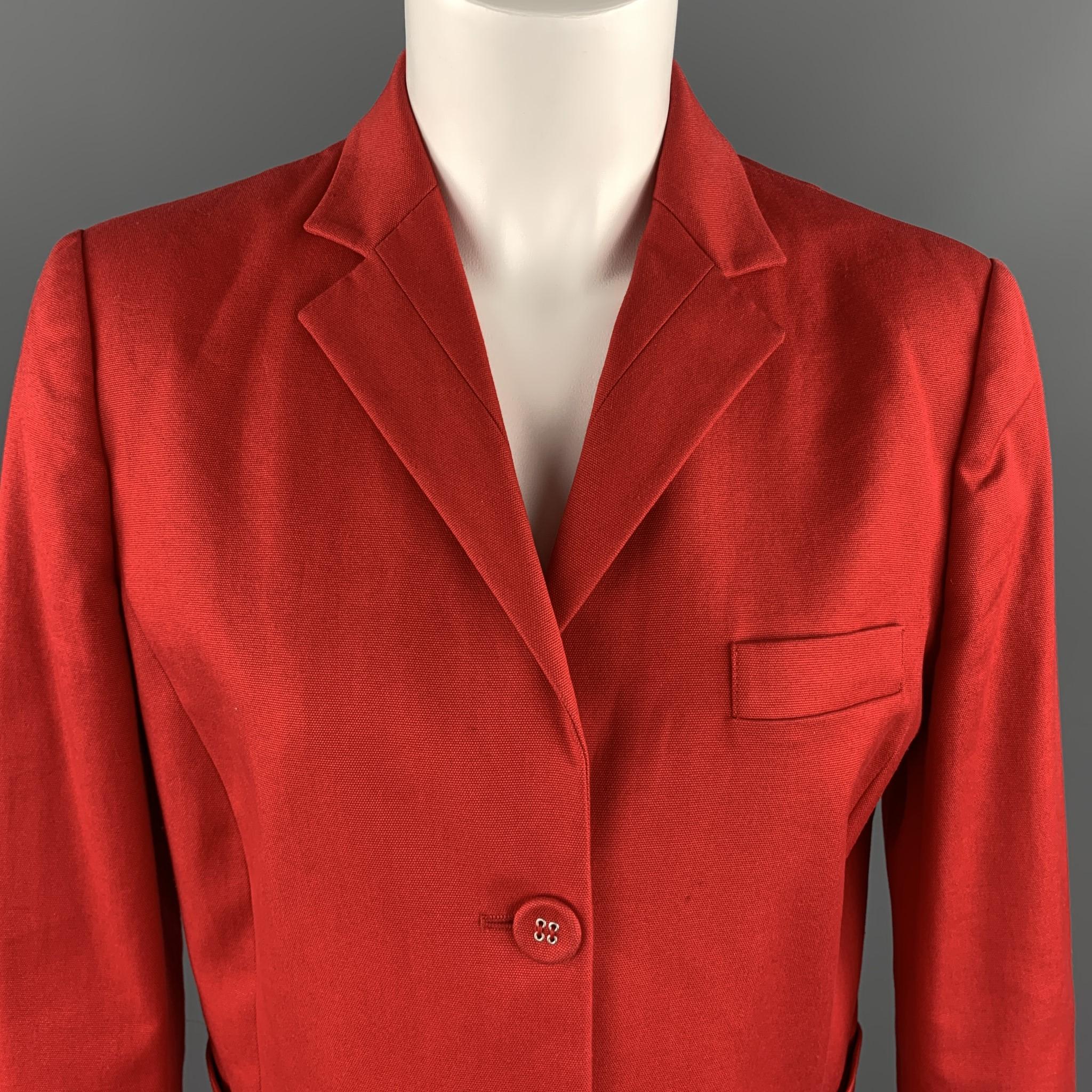 VALENTINO RED cropped blazer comes in bold red textured stretch cotton with a notch lapel and two button front. Made in Italy.

Very Good Pre-Owned Condition.
Marked: USA 8

Measurements:

Shoulder: 16 in.
Bust: 40 in.
Sleeve: 25 in.
Length: 21