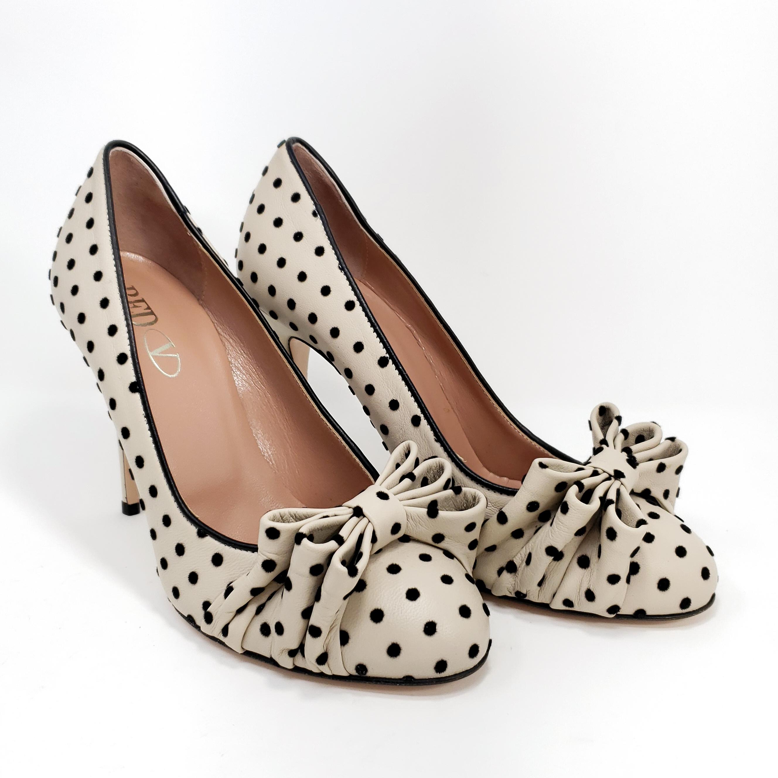Valentino Red Slip On Stiletto Bow and Polka Dot Heels.

These pumps feature fabric polka-dots on cream-colored genuine leather.

Heel height: 3.5 in / 9 cm

EU Size 38. 

Genuine leather, made in Italy.

Gently worn once or twice,  with natural