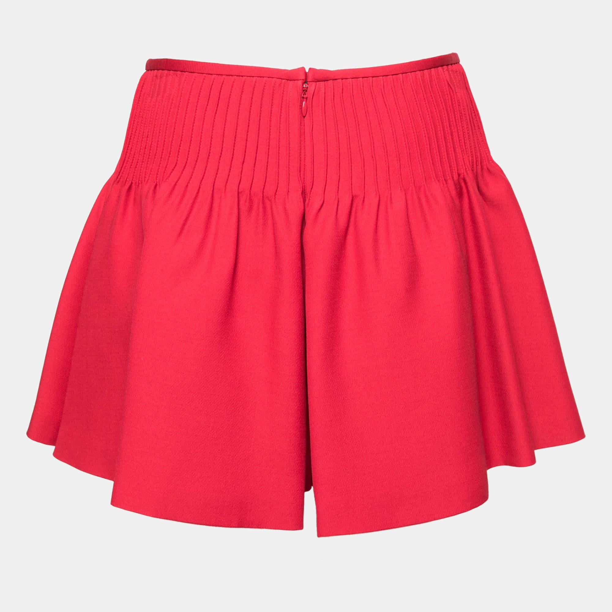 These shorts hail from the iconic house of Valentino. Crafted from wool and silk, they flaunt a lovely shade of red. They are great for a day off or a holiday. Pair with a simple t-shirt and slides.

Includes: Brand tag