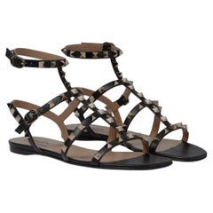 Valentino Rockstud – Flache Gladiator-Sandalen aus schwarzem Leder mit Gitterdesign, EU 40, US 10, Originalverpackung
