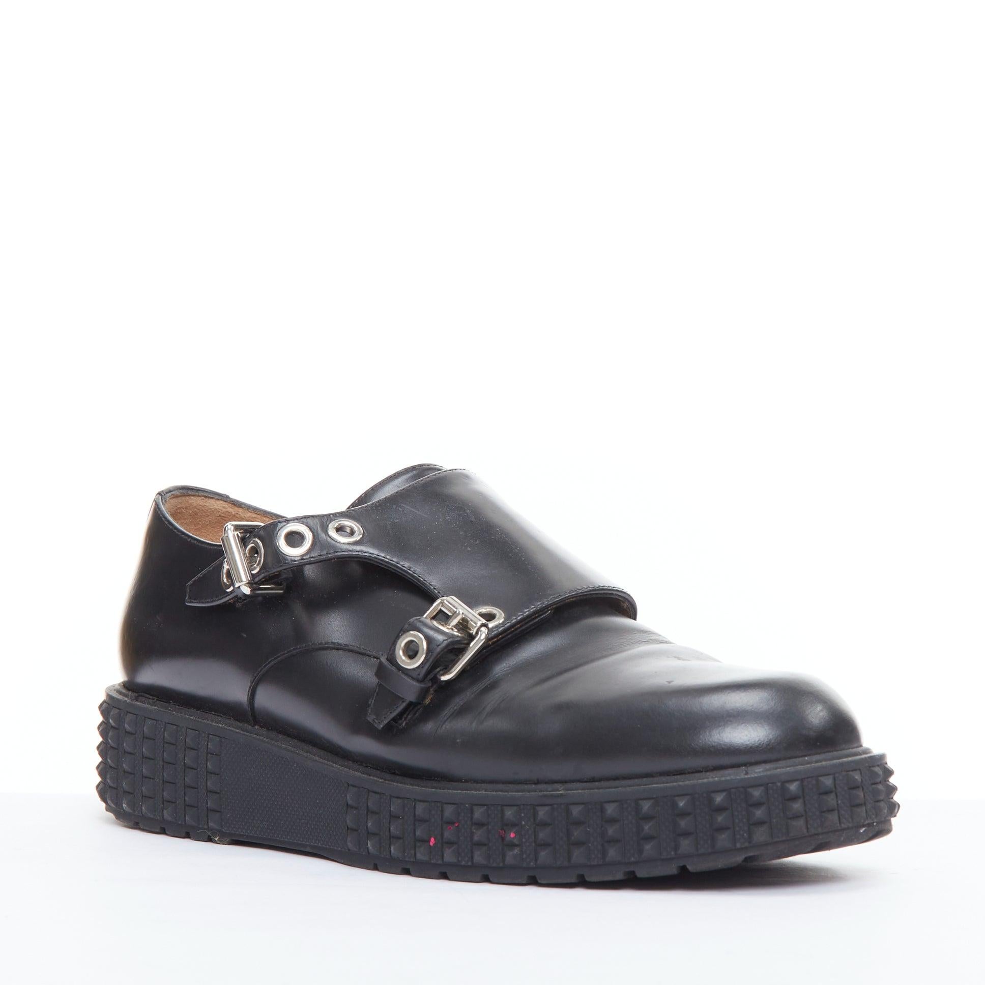 VALENTINO Rockstud black leather silver buckles stud midsole monk shoes EU38
Reference: ECLO/A00115
Brand: Valentino
Designer: Pier Paolo Piccioli
Collection: Rockstud
Material: Leather
Color: Black, Silver
Pattern: Solid
Closure: Buckle
Lining: