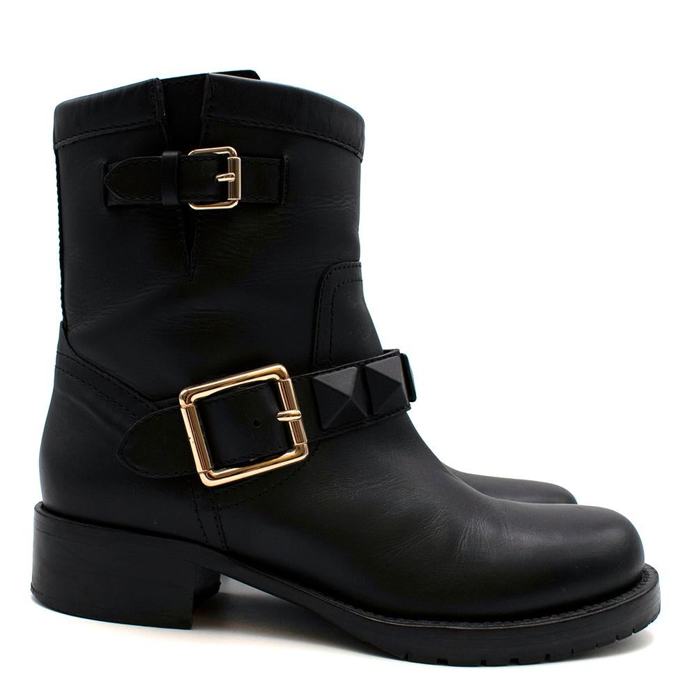 Valentino Military Inspired Black Ankle Boots with Rockstuds

-Trending powerful style 
-Luxurious soft leather 
-Iconic Rockstud details with buckle fastening 
-Golden hardware 
-Rubber soles for extra adherence
-Perfect for a winter day 
-Original