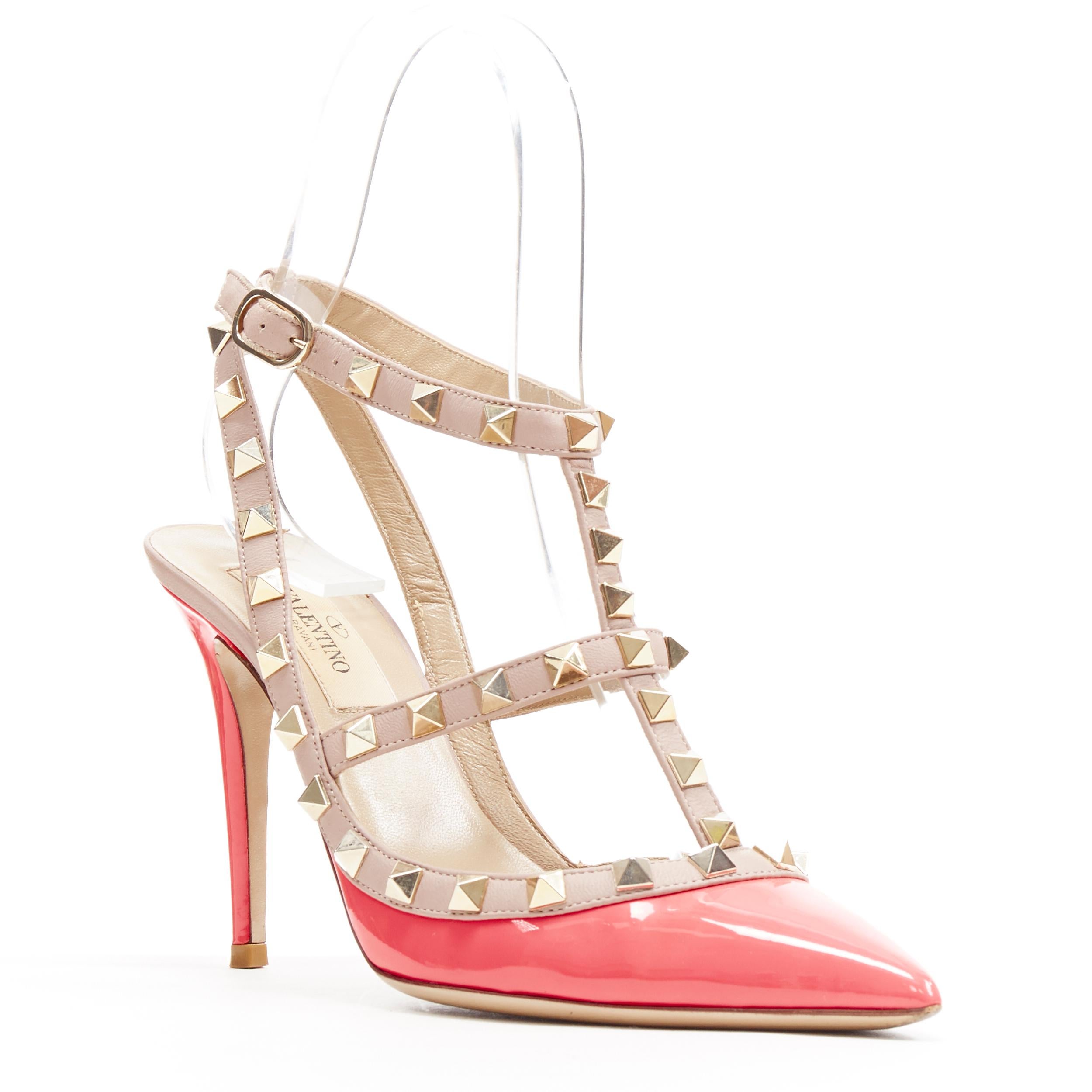 VALENTINO Rockstud neon pink patent gold studded caged point toe heel EU35.5
Brand: Valentino
Model Name / Style: Rockstud pump
Material: Patent leather
Color: Pink
Pattern: Solid
Closure: Ankle strap
Extra Detail: High (3-3.9 in) heel height.