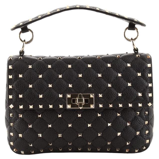 black spike purse
