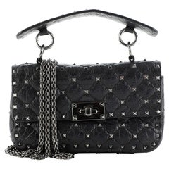 Valentino Rockstud - Sac à rabat à pointes en cuir matelassé petit modèle