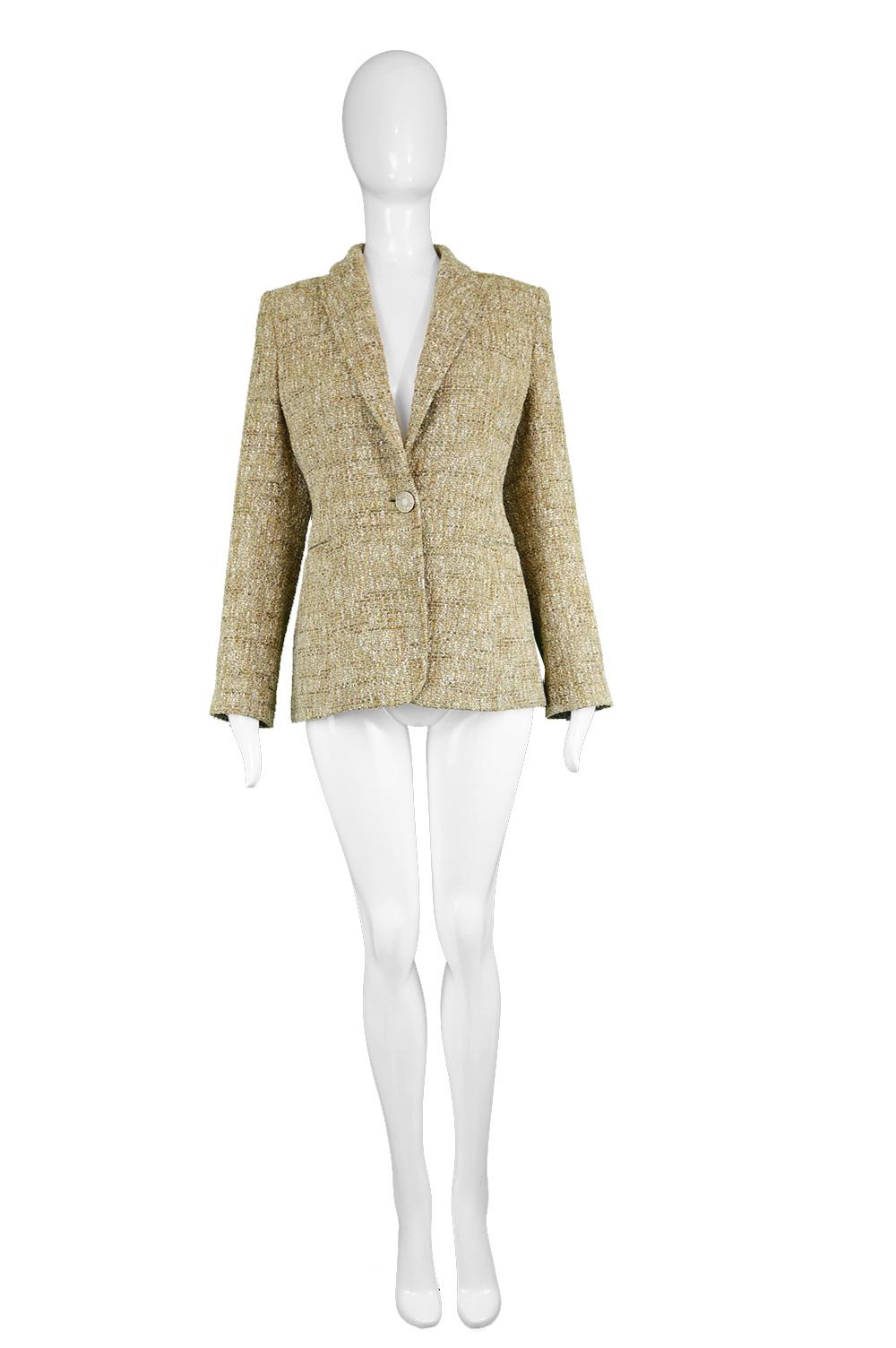 A chic Valentino Roma tailored blazer jacket in an oatmeal colored wool and silk blend nubby bouclé tweed with subtle green and brown flecks throughout. Fastens with a single statement button at the front, engraved with 'Valentino Roma' and matching