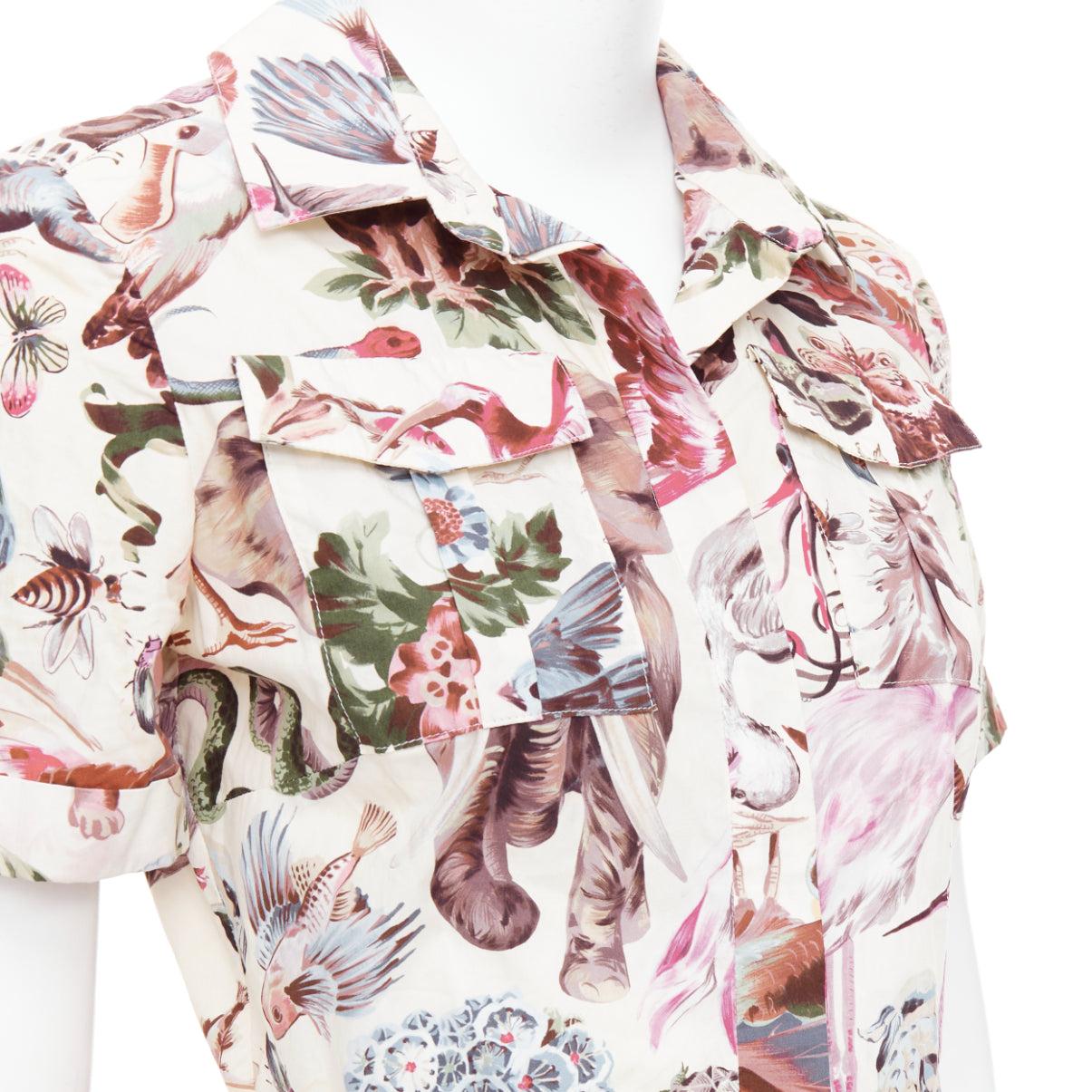 VALENTINO Roman Safari 2015  100% silk cream animal print safari dress Sz4 S
Reference: GEGG/A00118
Brand: Valentino
Designer: Pier Paolo Piccioli
Collection: Roman Safari  2015
Material: Silk
Color: Cream, Pink
Pattern: Animal Print
Closure: