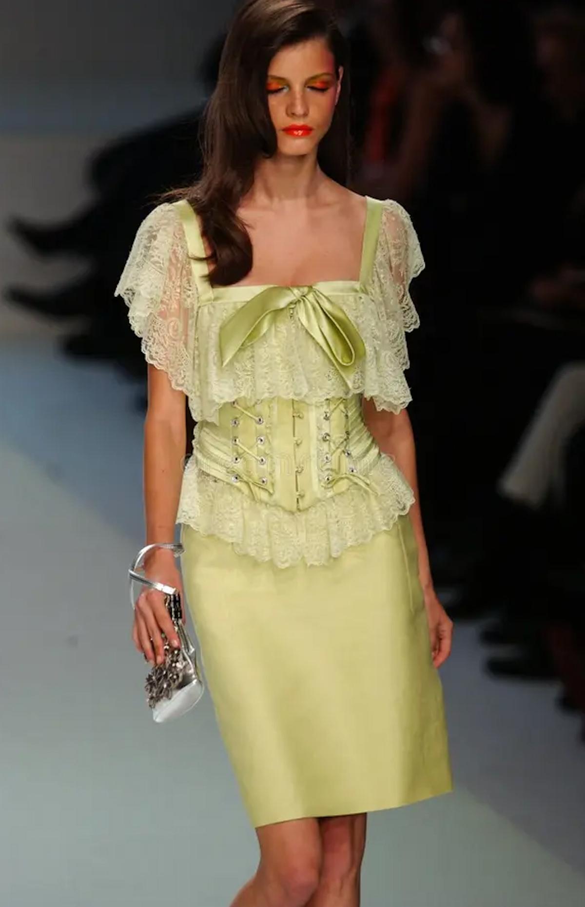 Valentino Spring/Summer 2004 corset, as seen on the runway. Lime green with corset tie laces, lace details and satin bow. A butterfly printed version was worn by Bella Hadid.

Condition

Corset: New with tags

Skirt: Very good


Marked Size

Corset: