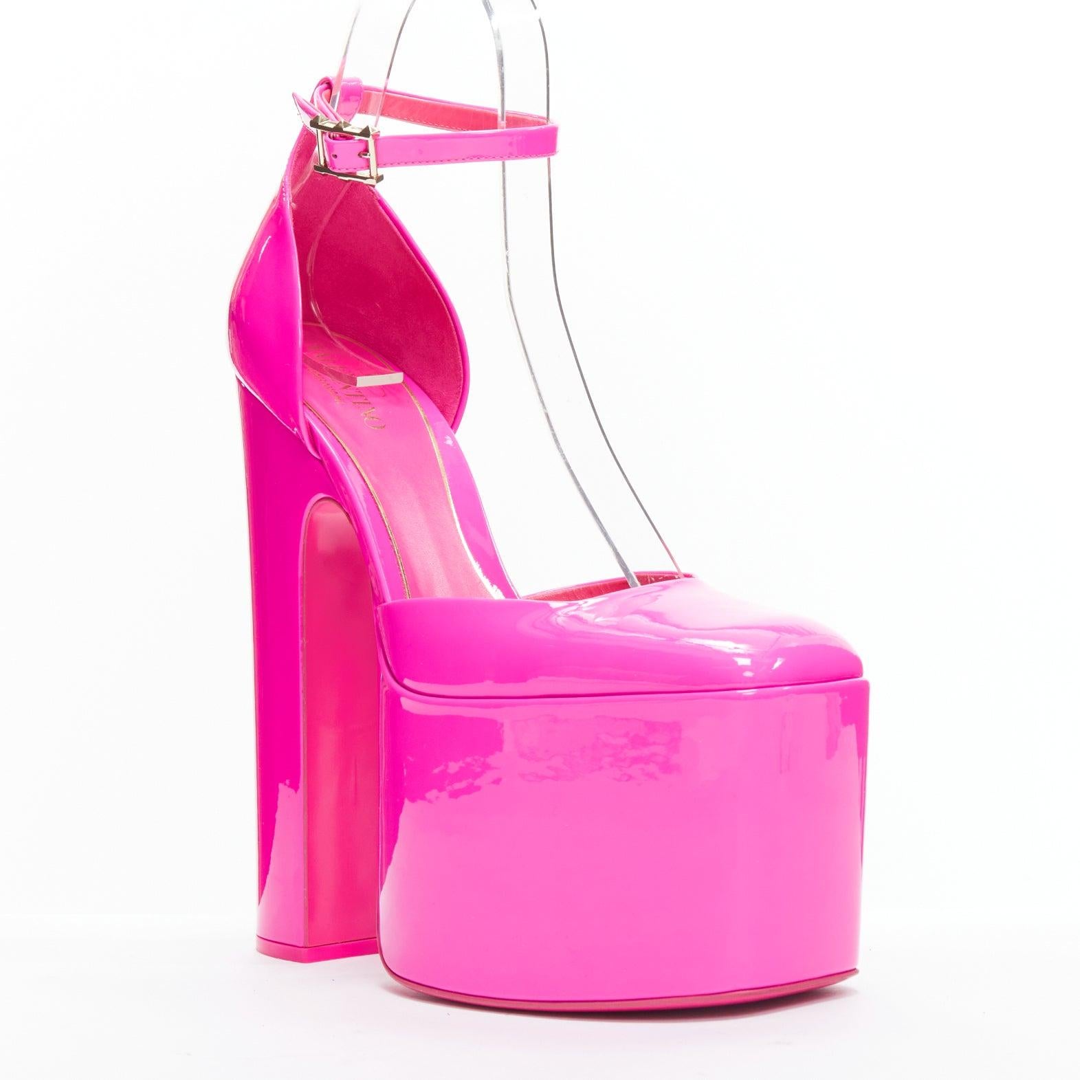 VALENTINO Runway Discobox 180 hot pink patent platform ankle strap heels EU39
Reference: AAWC/A00550
Brand: Valentino
Designer: Pier Paolo Piccioli
Model: Discobox 180
Collection: 2022 - Runway
Material: Patent Leather
Color: Neon Pink
Pattern: