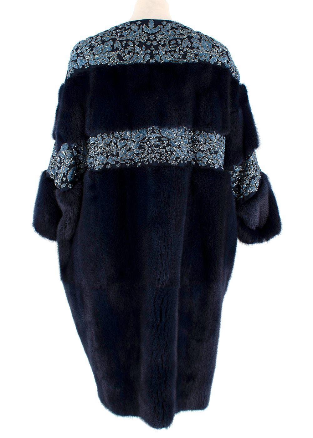 Valentino Runway Navy Floral Sequin Panelled Mink Fur Coat 2022

-Navy mink fur body 
-Bead leaf embellishment panels 
-Mid-weight construction 
-Fully lined, silk lining 
-Snap button fastening 
-Balloon sleeves 
-Round collar 

Material: 

Mink