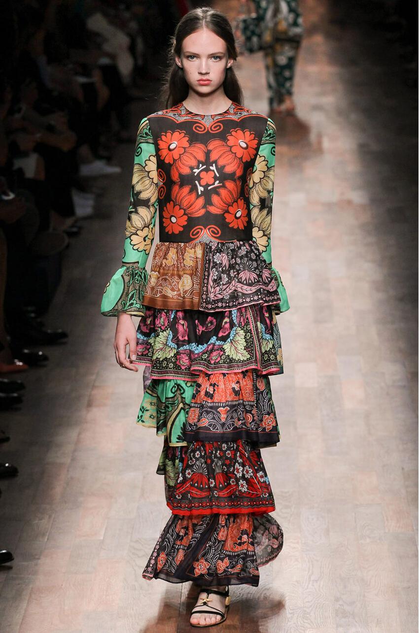 VALENTINO

S/S 2015 Look # 14

RUFFLE PATCHWORK FLORAL GOWN
Poppy Delevingne was in attendance at the Tiffany & Co. immersive exhibition ‘Fifth & 57th’ at The Old Selfridges Hotel on July 1, 2015 in London, England.

Bohemian style, long sleeves,