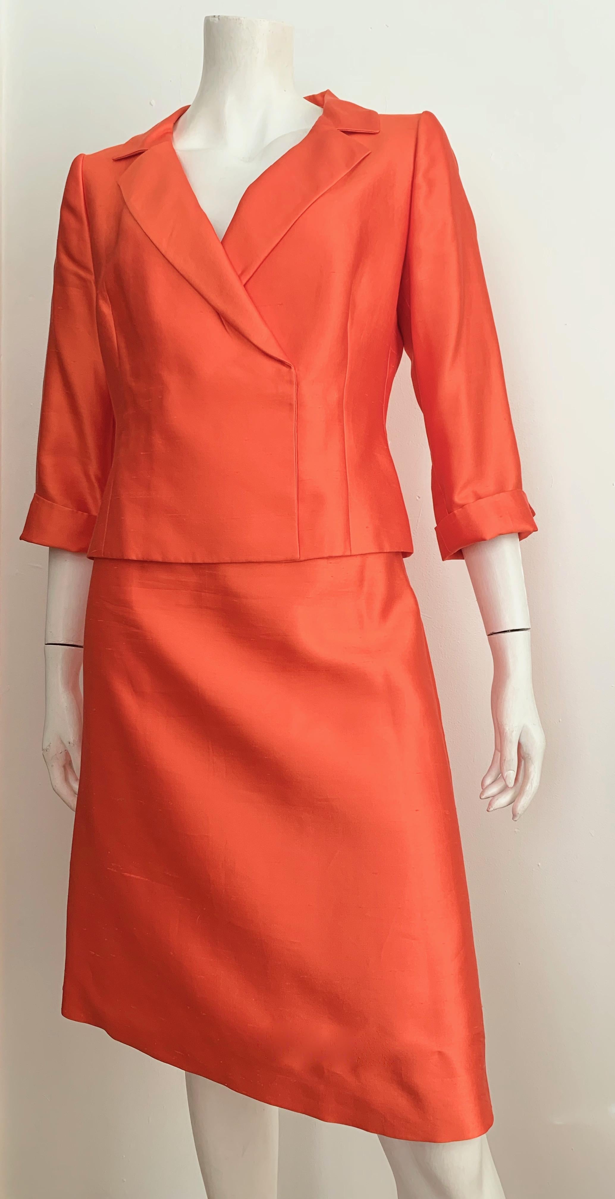 Valentino silk & cotton blend orange jacket & skirt suit is a size 10.
Jacket is beautifully lined.
No shoulder pads.
Skirt is lined with side zipper.
Worn together as suit set or broken up either way this is a stunning classic design.
Wear the