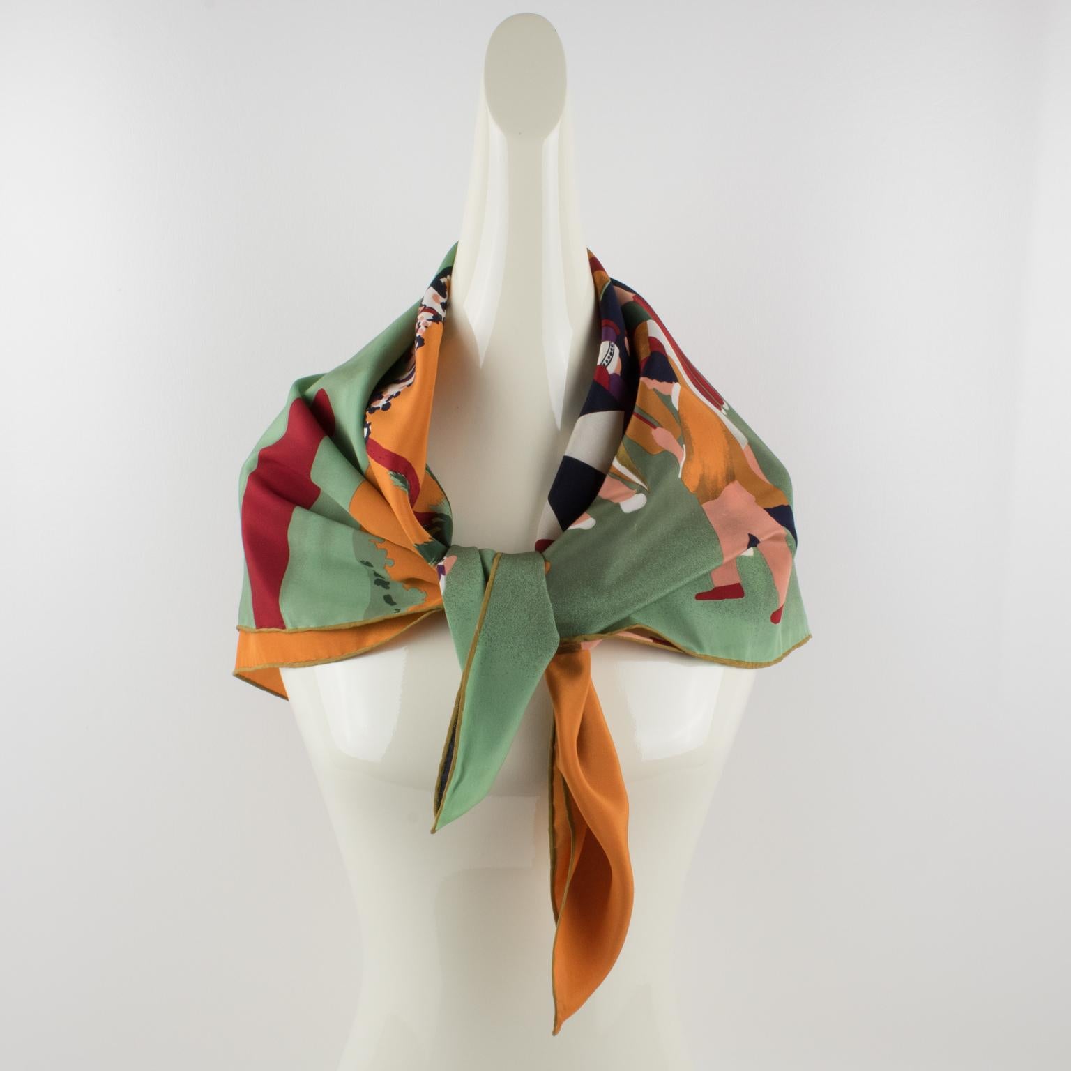 Elegant silk scarf by Valentino Garavani. Golf tournament print pattern in a combination of multicolor tones (red burgundy, black, saffron, white, purple) with an almond green and warm orange background. Signed Valentino in the bottom right corner.