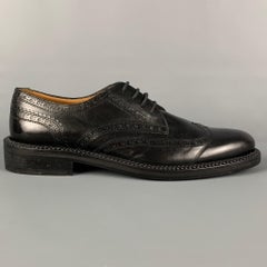 VALENTINO Taille 10.5 Chaussures à lacets en cuir perforé noir