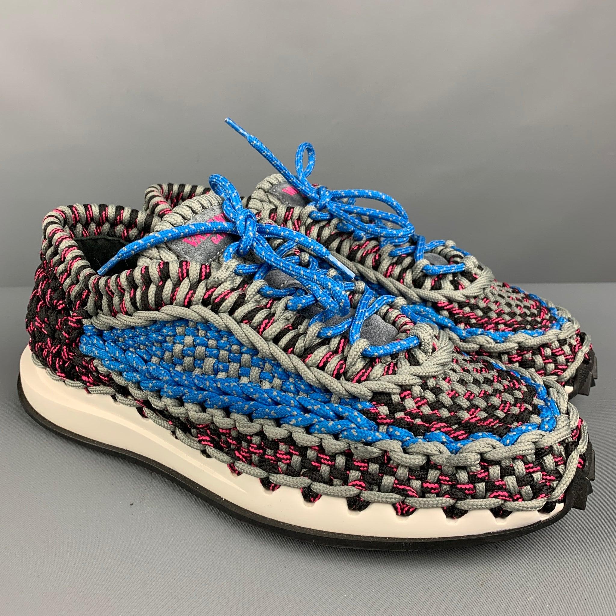 VALENTINO sneakers
in a multicolor fabric featuring an all over woven shoelace style, and lace up closure. Made in Italy. Excellent Pre-Owned Condition. 

Marked:   TXE41Y2 44Outsole: 12.5 inches  x 4.75 inches 
  
  
Reference: 127030
Category: