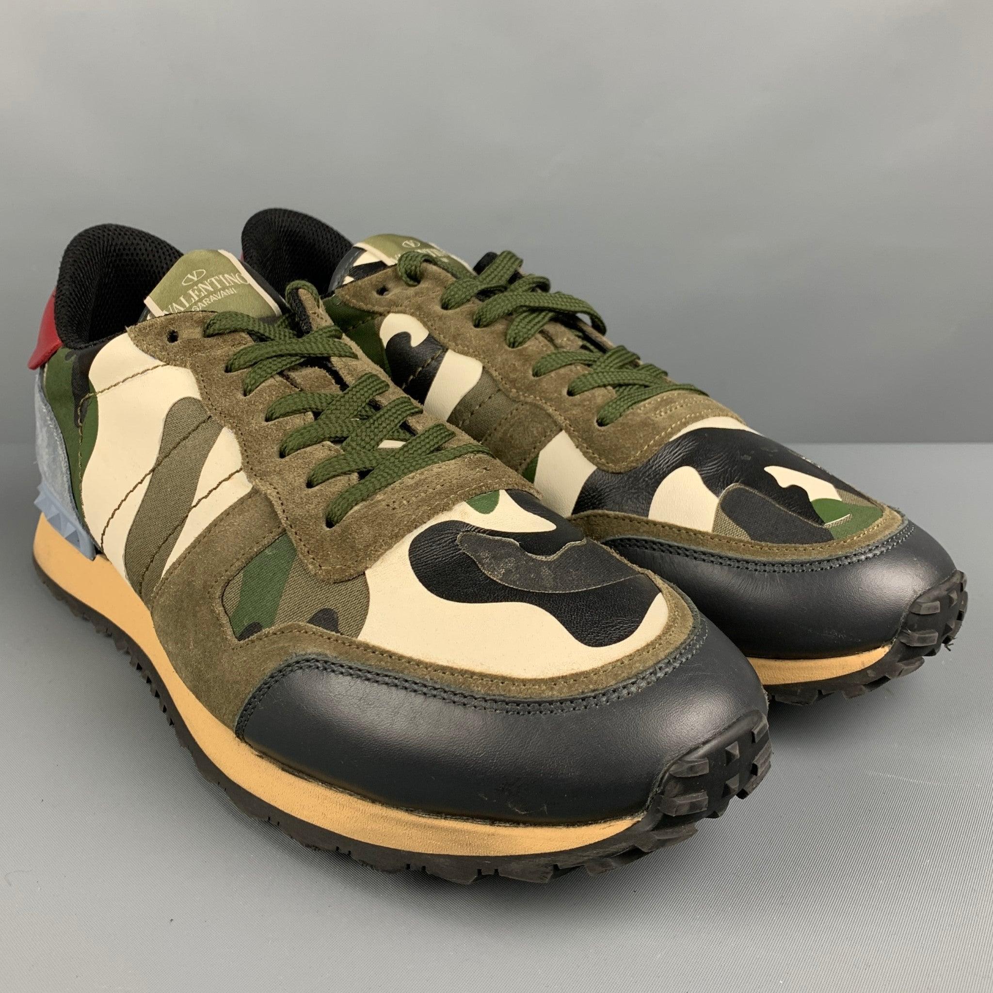 VALENTINO sneakers in a multi color leather featuring a camo pattern, suede trim and heel, and low top style. Comes with box. Made in Italy. Excellent Pre-Owned Condition. 

Marked:   45/TJ 723 45Outsole: 12.25 inches  x 4.25 inches 
  
 
