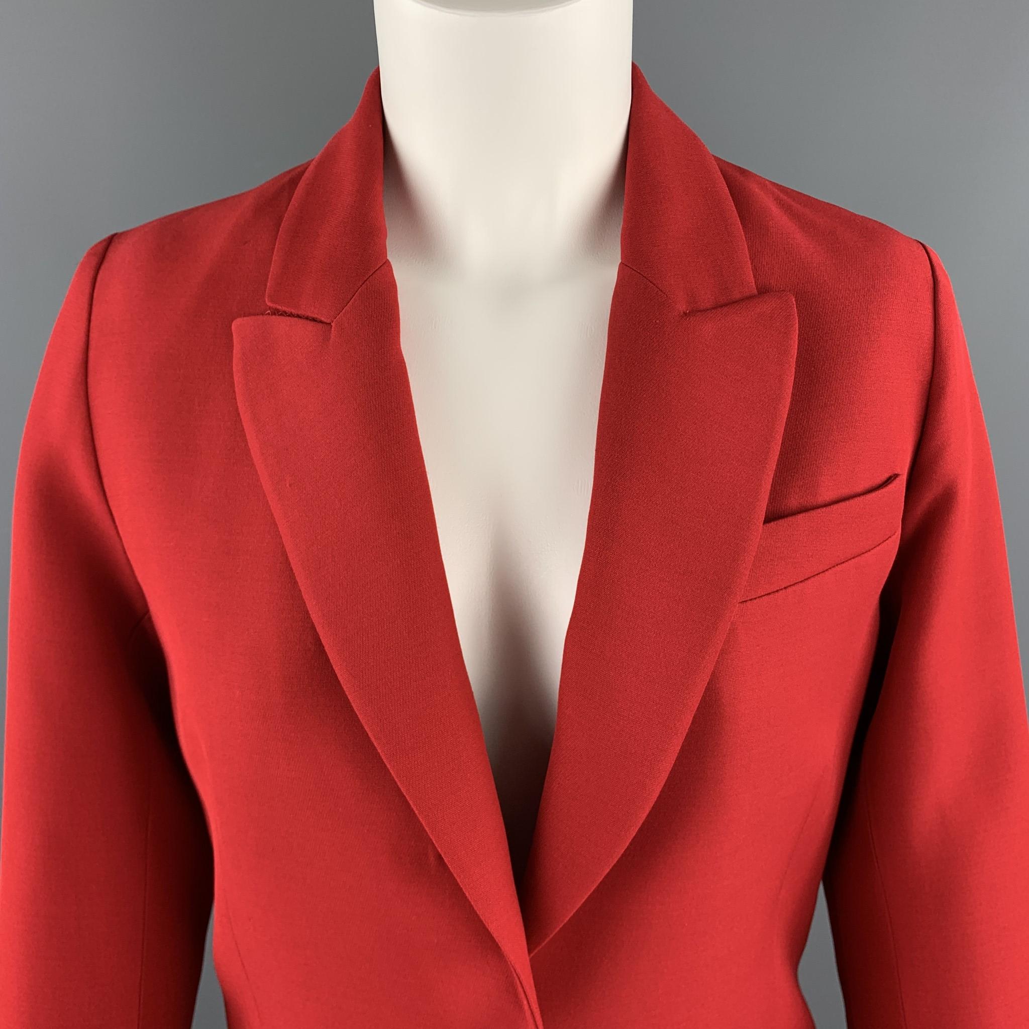 VALENTINO blazer comes in bold red silk wool blend fabric with a pak lapel, single breasted two button front, and oversized silhouette. Made in Italy.

Excellent Pre-Owned Condition.
Marked: US 2

Measurements:

Shoulder: 15.5 in.
Bust: 36