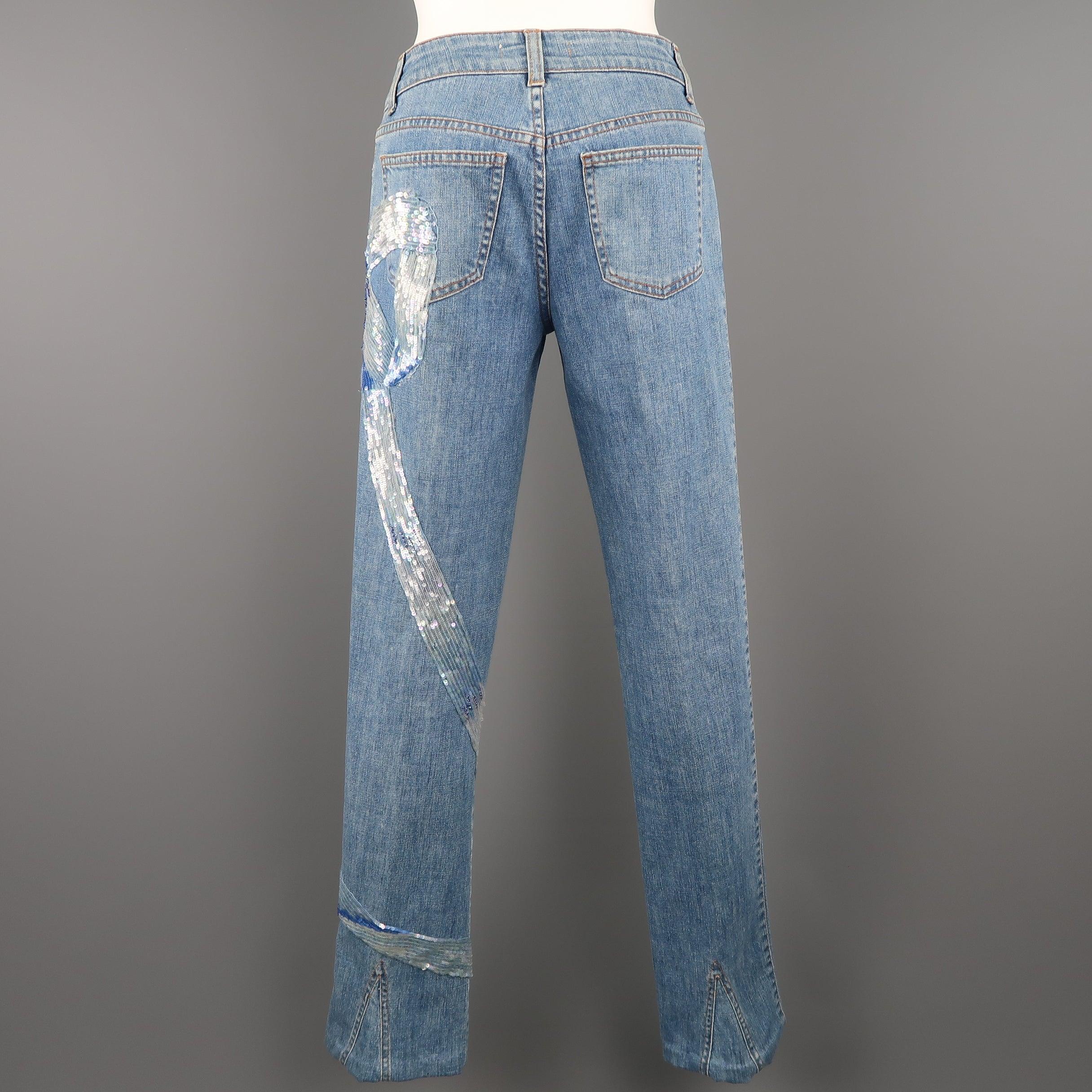 VALENTINO jeans come in a light wash stretch denim with a light blue sequin beaded bow motif down the side. Made in Italy.Excellent Pre-Owned Condition. 

Marked:   4 

Measurements: 
  Waist: 29 inches Rise: 8.5 inches Inseam: 32 inches 
  
  
