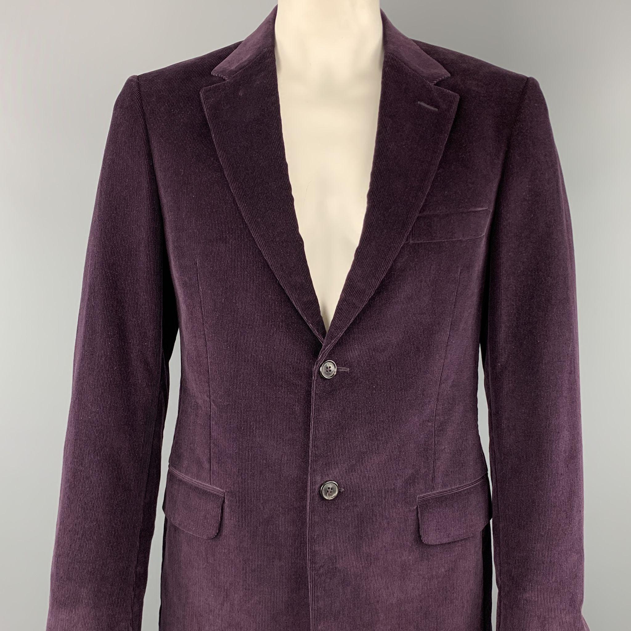 VALENTINO sport coat comes in a purple corduroy cotton with a full liner featuring a notch lapel, flap pockets, single back vent, and a double button closure. Made in Italy.
Excellent
Pre-Owned Condition. 

Marked:   40/50 R 

Measurements: 
